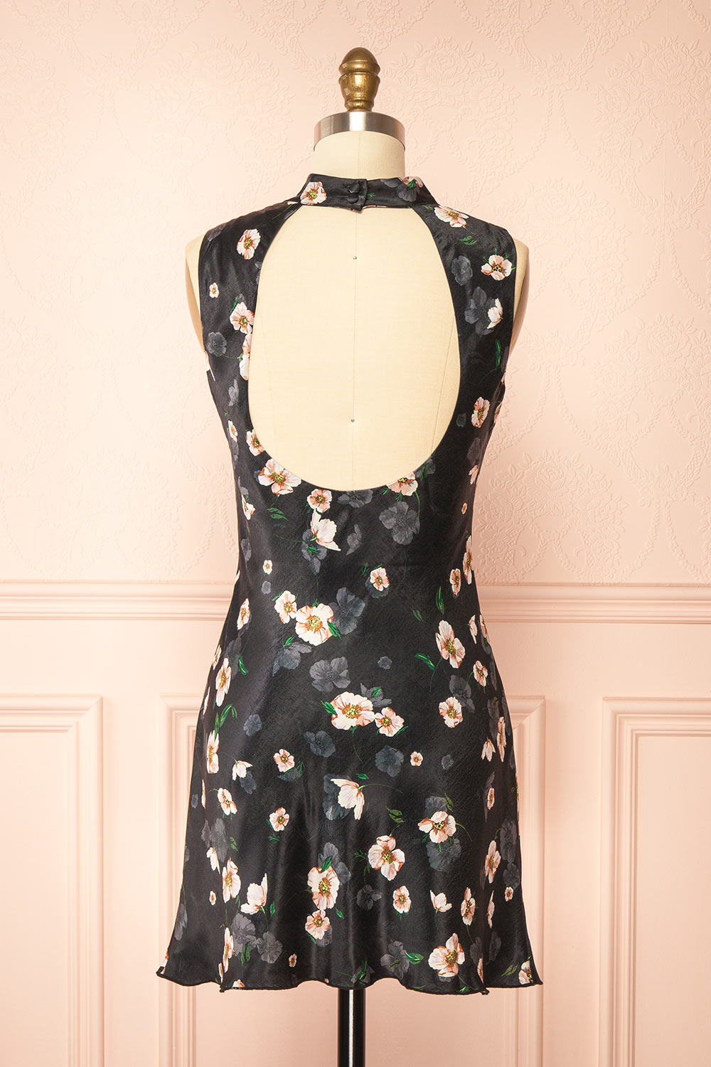 back view of sewing mannequin wearing Dalilah Short Floral Dress with Open Back from Boutique 1861
