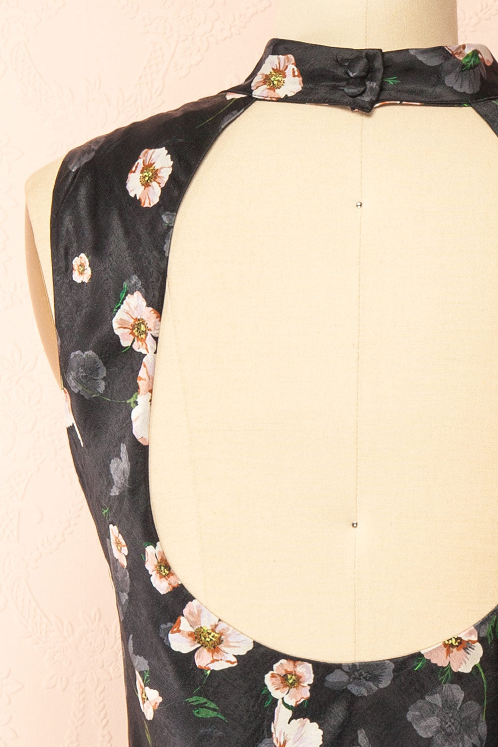 back of sewing mannequin wearing Dalilah Short Floral Dress with Open Back from Boutique 1861
