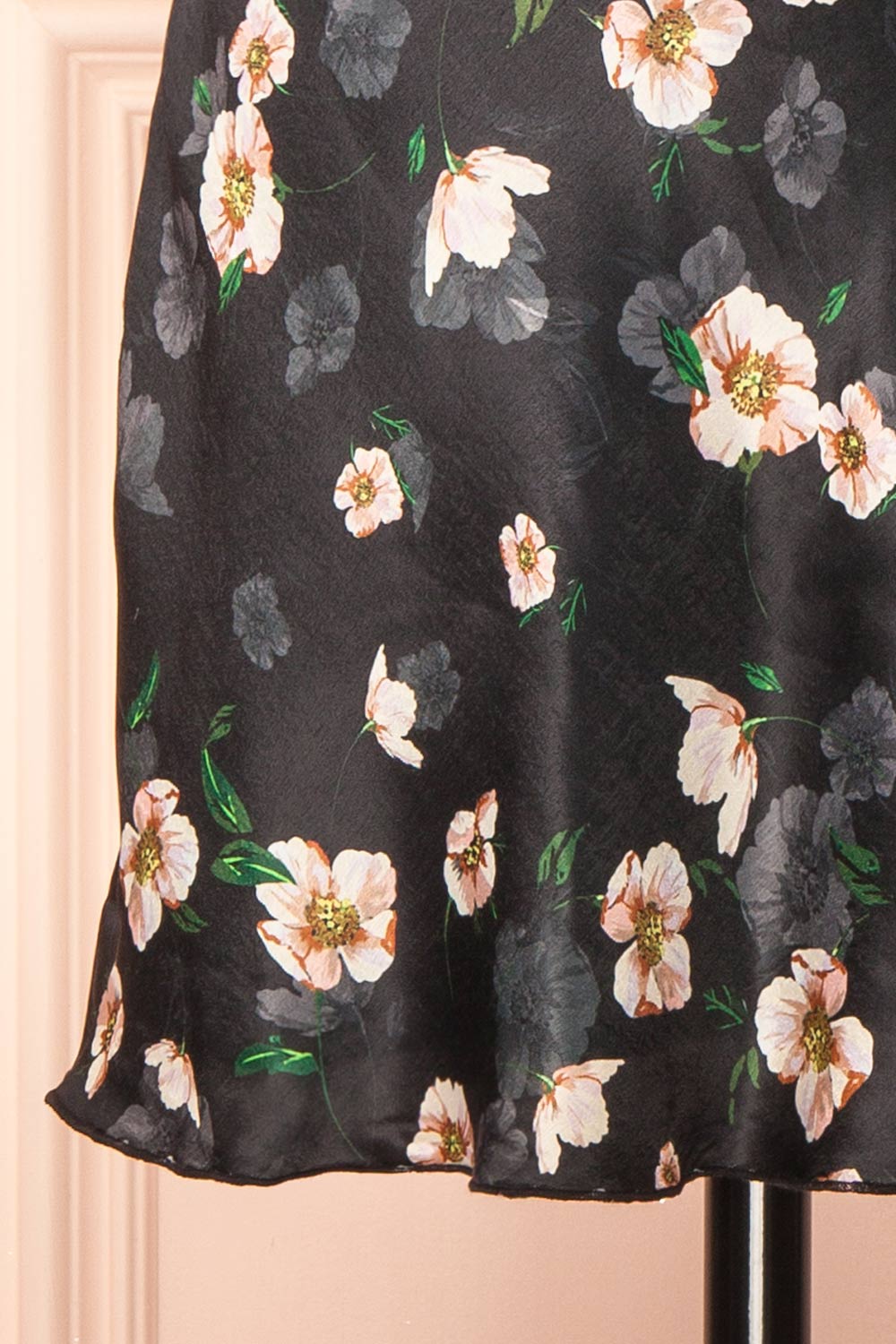 bottom of sewing mannequin wearing Dalilah Short Floral Dress with Open Back from Boutique 1861