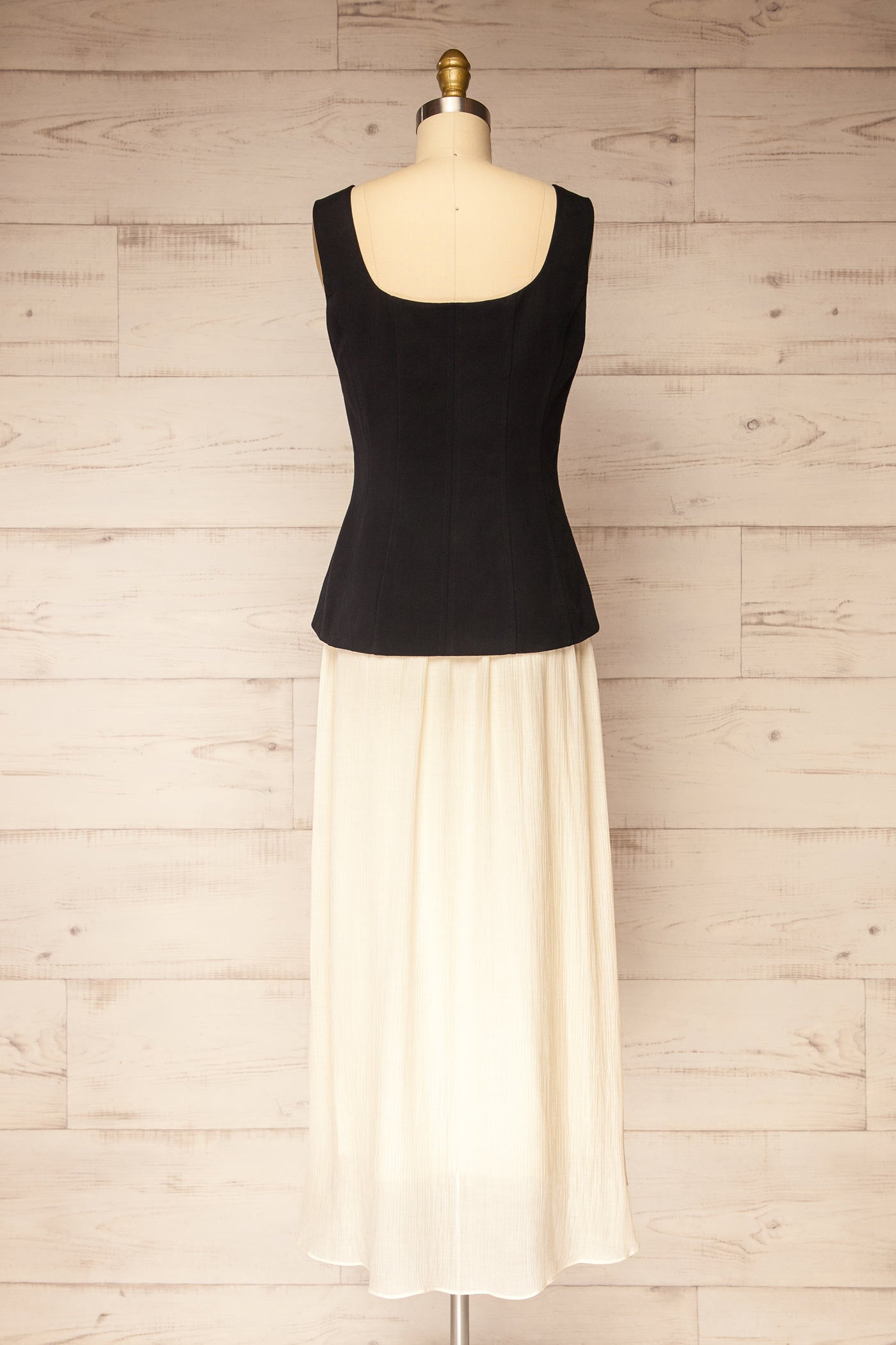 Back view Dhule Black Sleeveless Contrast Maxi Dress with Button Front at la petite garçonne