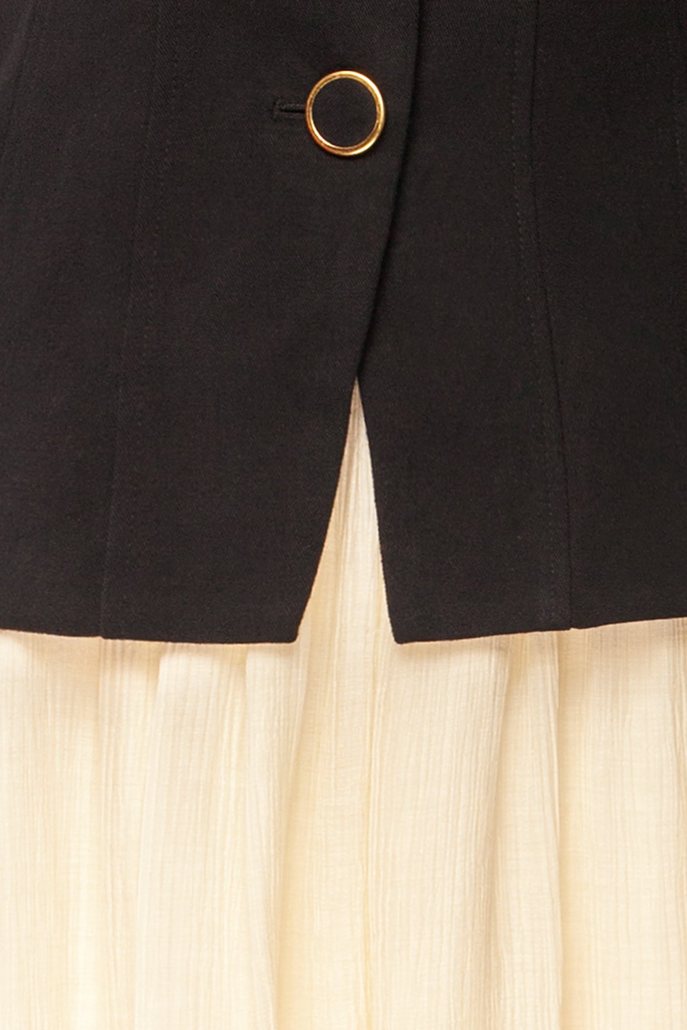 Close-up view Dhule Black Sleeveless Contrast Maxi Dress with Button Front at la petite garçonne
