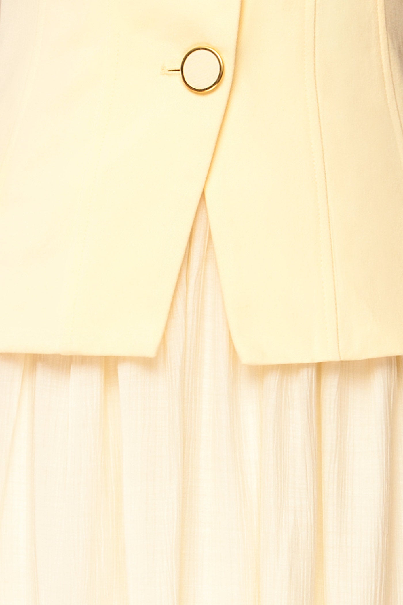 Close-up view Dhule Light Yellow Sleeveless Contrast Maxi Dress with Button at la petite garçonne