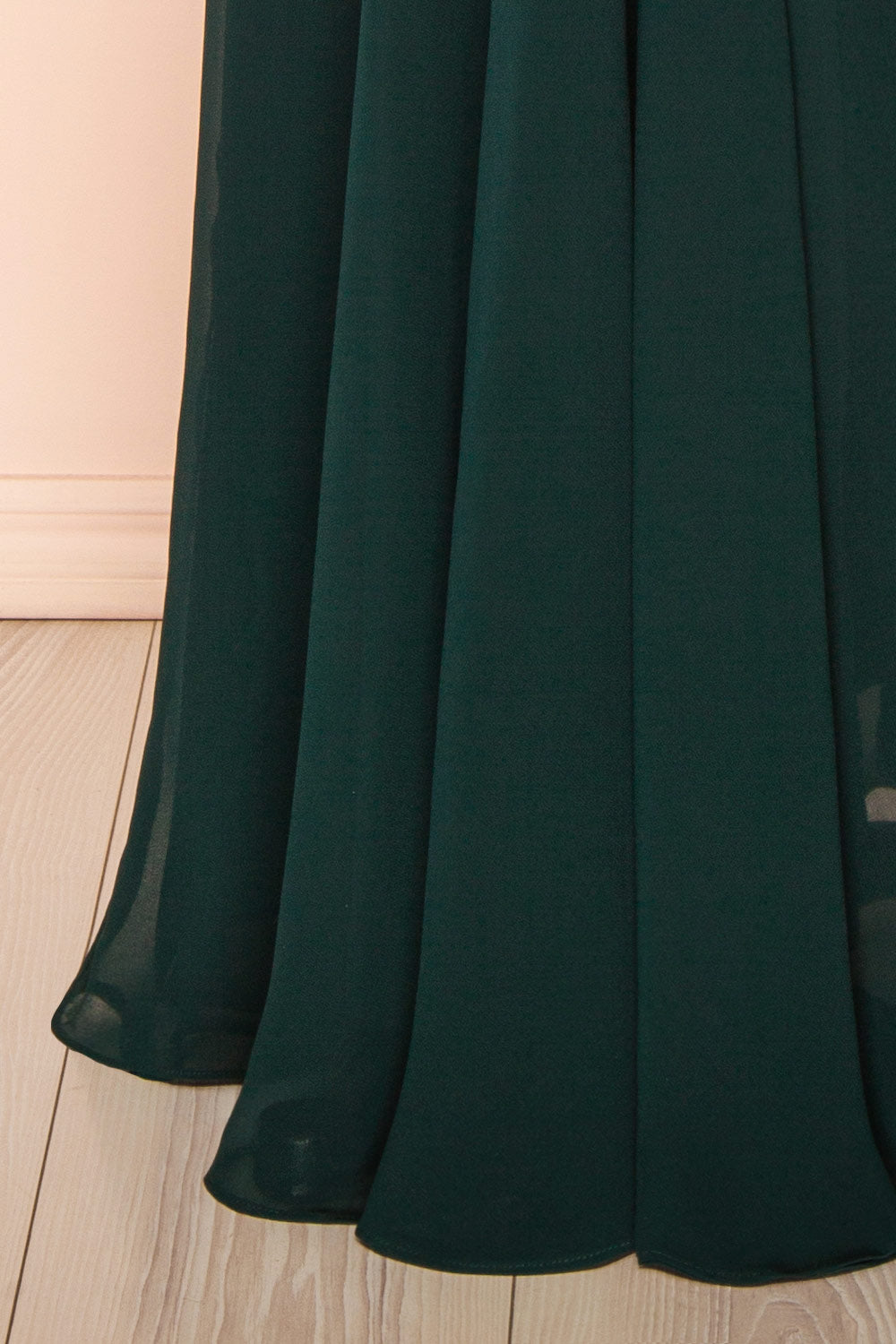 bottom of mannequin wearing Diana green Exclusive 1861 A-Line Chiffon Dress with Slit from Boutique 1861