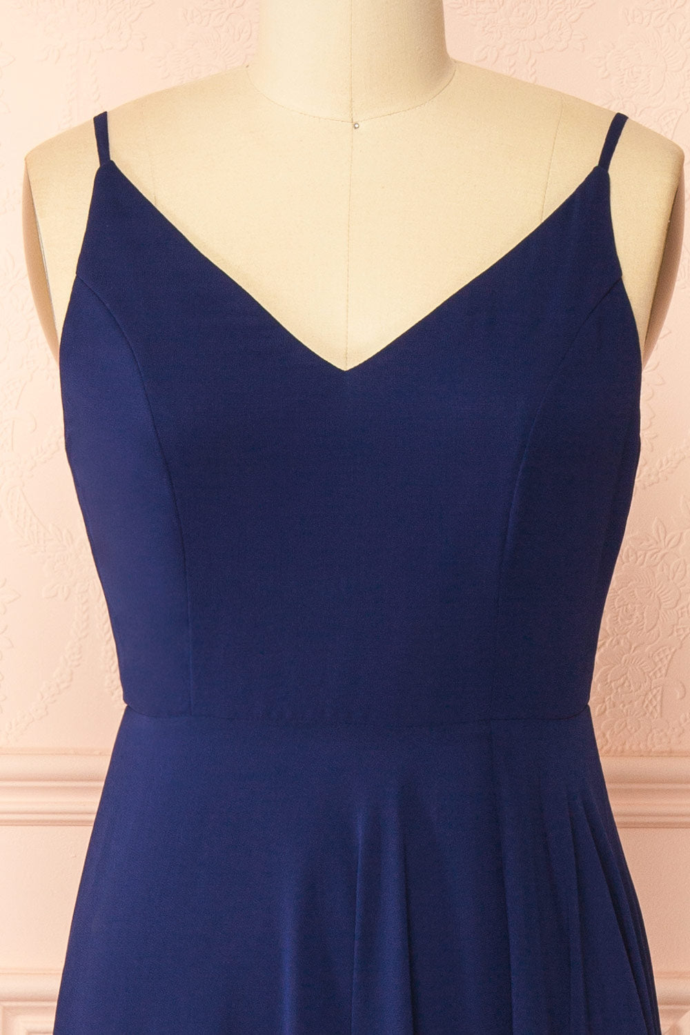 front of mannequin wearing Diana Navy Exclusive 1861 A-Line Chiffon Dress with Slit from Boutique 1861