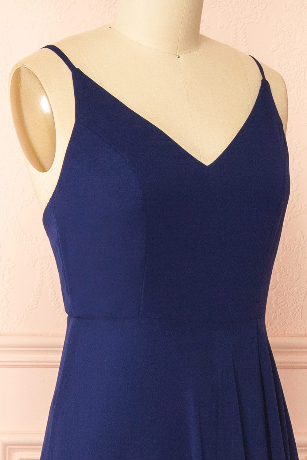 side of mannequin wearing Diana Navy Exclusive 1861 A-Line Chiffon Dress with Slit from Boutique 1861
