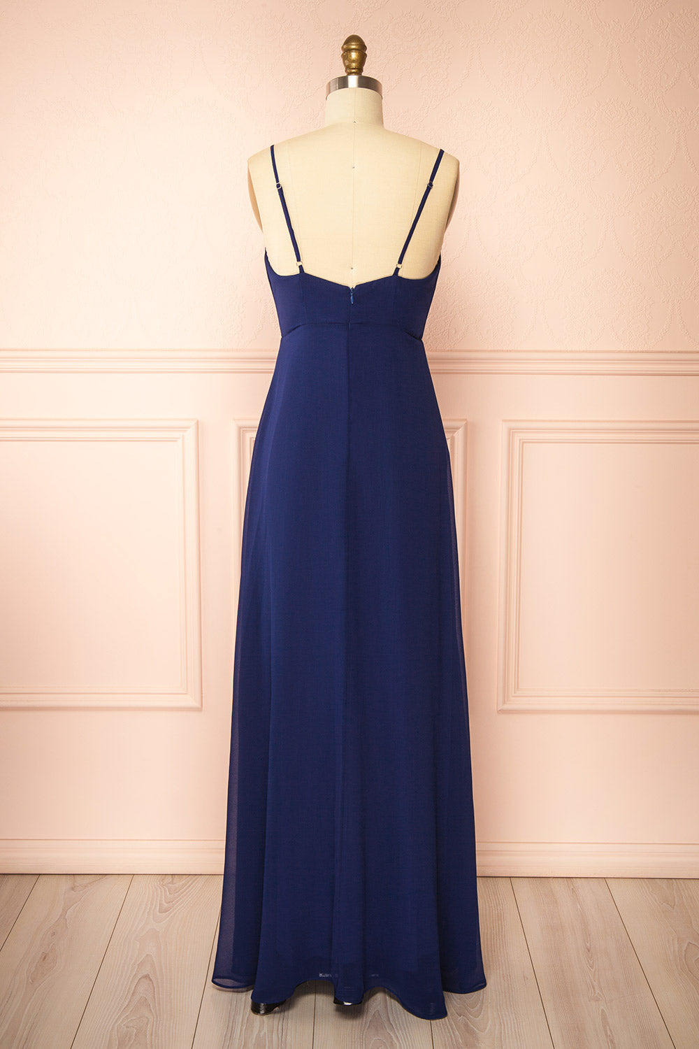 back view of mannequin wearing Diana Navy Exclusive 1861 A-Line Chiffon Dress with Slit from Boutique 1861