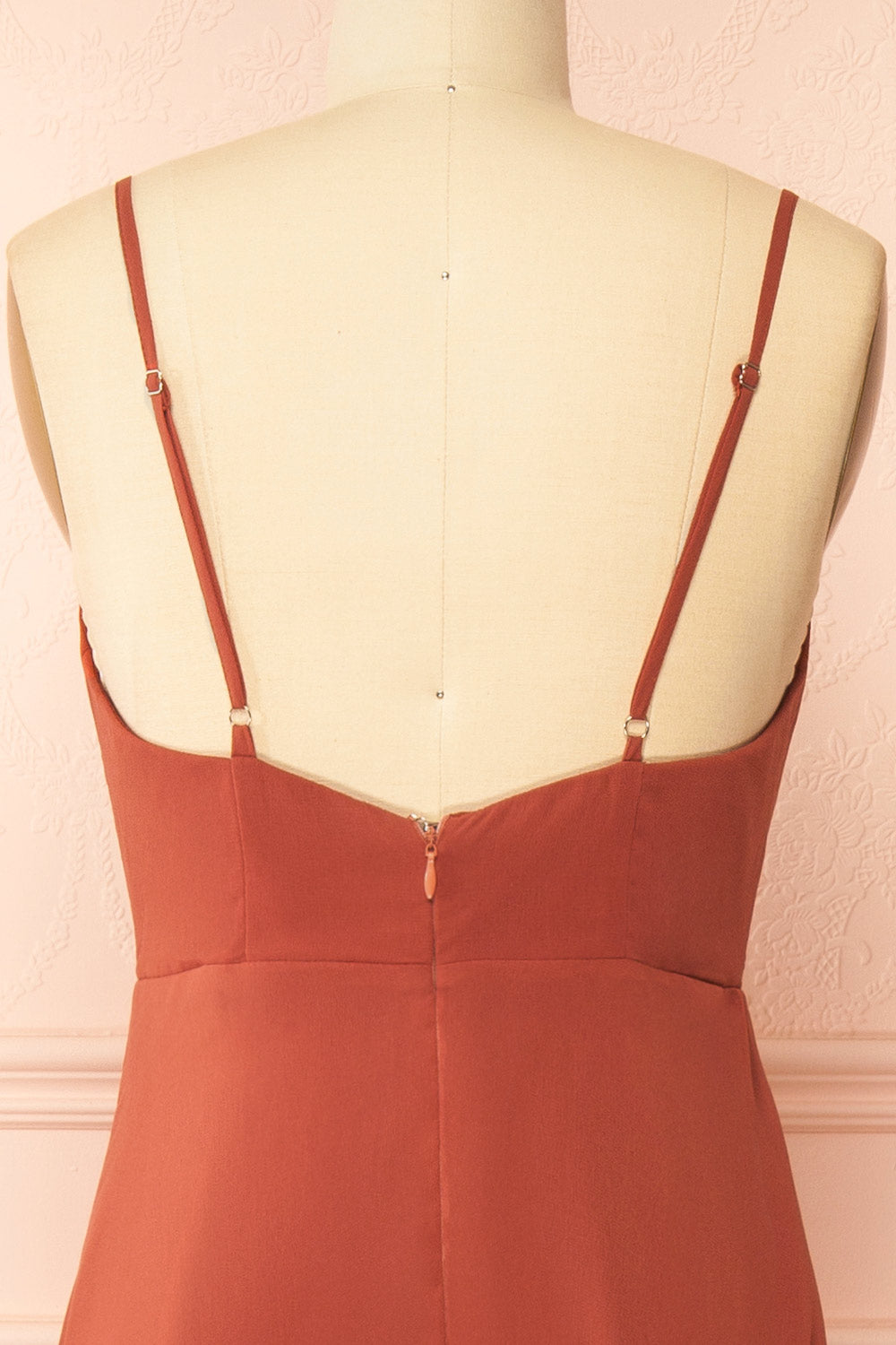 back of a mannequin wearing Diana Rust Exclusive 1861 A-Line Chiffon Dress with Slit | Boutique 1861