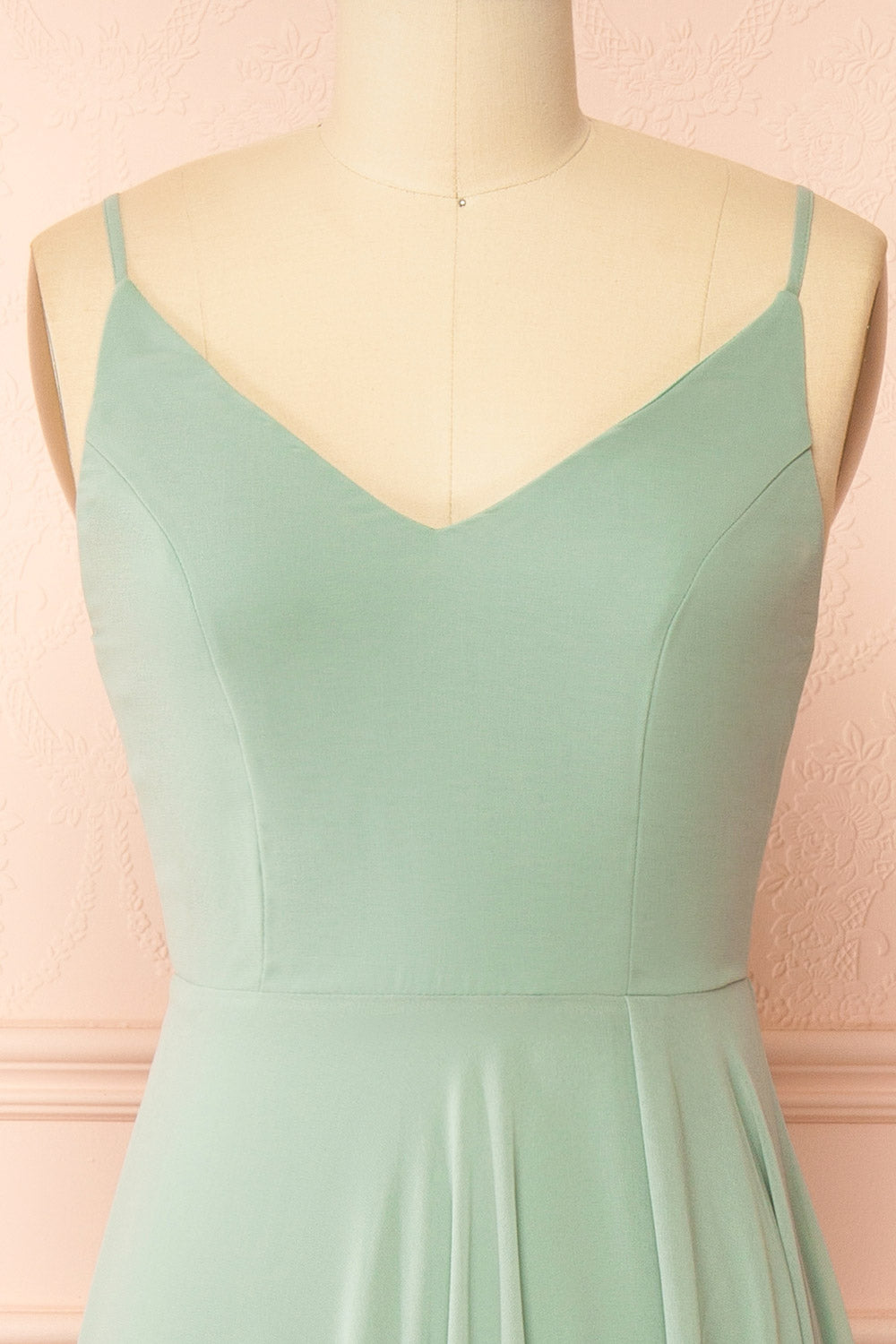 front of a mannequin wearing Diana Rust Exclusive 1861 A-Line Chiffon Dress with Slit | Boutique 1861