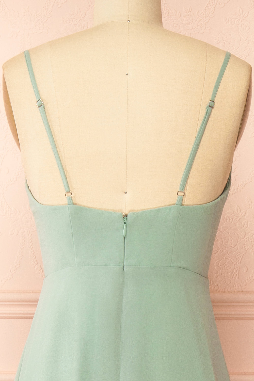 back of a mannequin wearing Diana Rust Exclusive 1861 A-Line Chiffon Dress with Slit | Boutique 1861