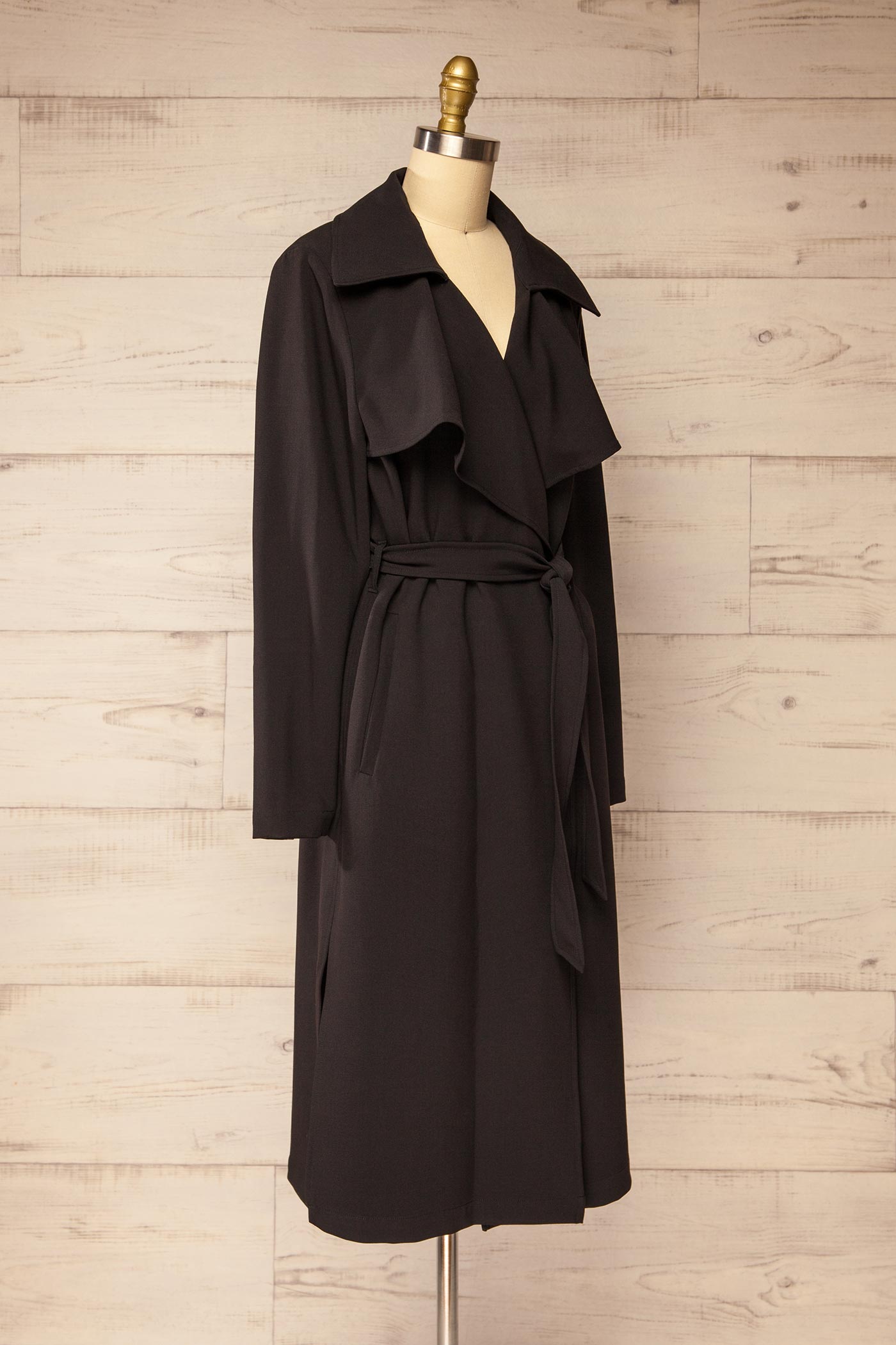 side view Dimitra Black Long Belted Coat with Storm Flaps at La petite garçonne
