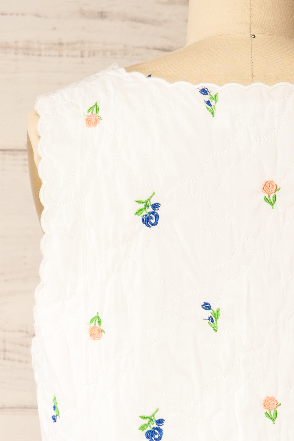 Dobhan White Floral Quilted Sleeveless Top | La petite garçonne back