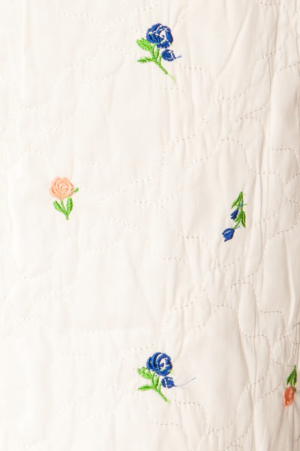 Dobhan White Floral Quilted Sleeveless Top | La petite garçonne fabric