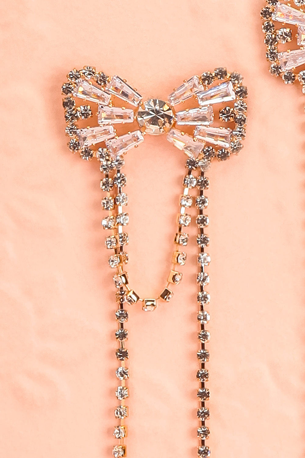 Dolaricia Gold Bow Earrings with Pendant Chains | Boutique 1861 close-up