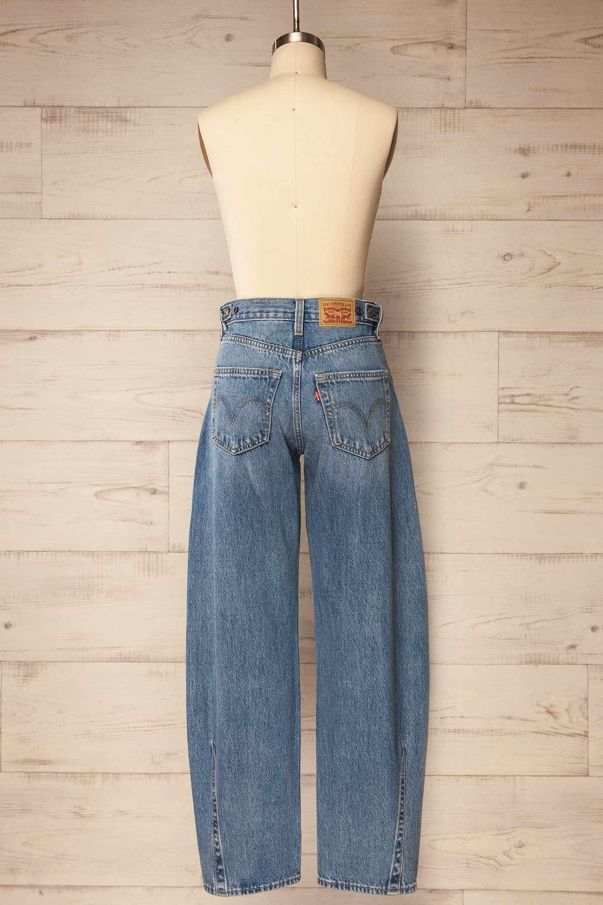 back view of Douma Blue Barrel Denim Pants at La petite garçonne