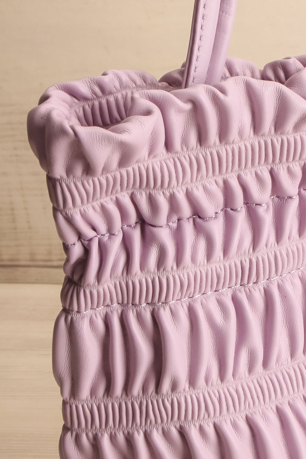 Duroque Lilac Drawstring Shoulder Bag | La petite garçonne side close-up