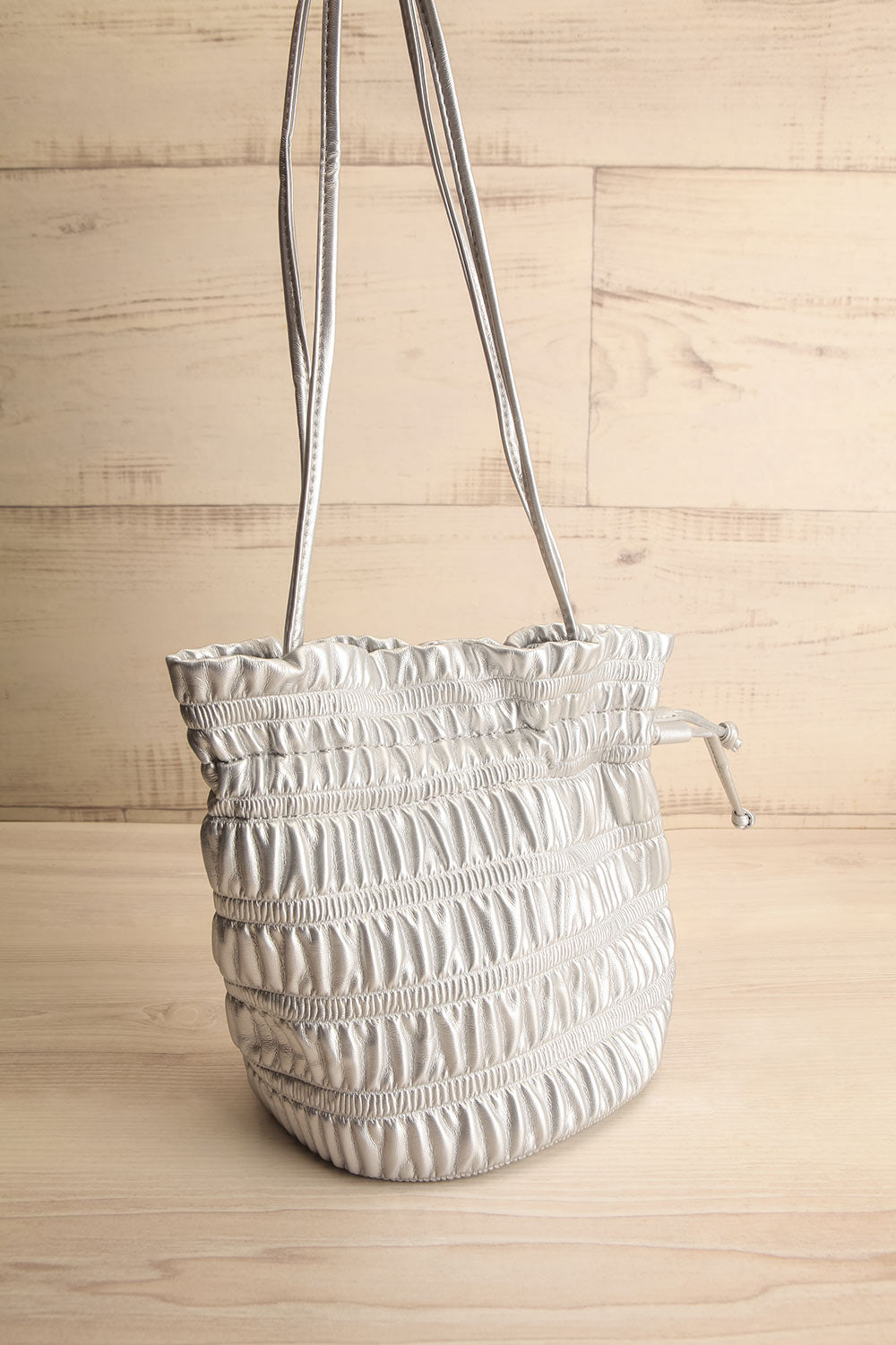 Duroque Silver Drawstring Shoulder Bag | La petite garçonne side view