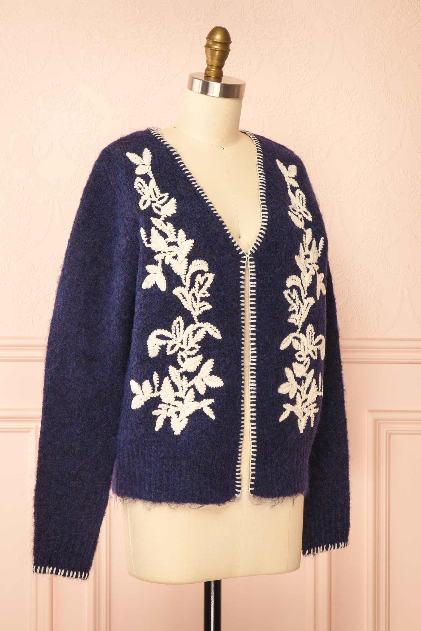 side view of Edulia Navy Knit Cardigan with Floral Embroidery at La petite garçonne