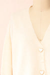 Elarisse Ivory Knit Cardigan w/ Heart Buttons | Boutique 1861 front close-up