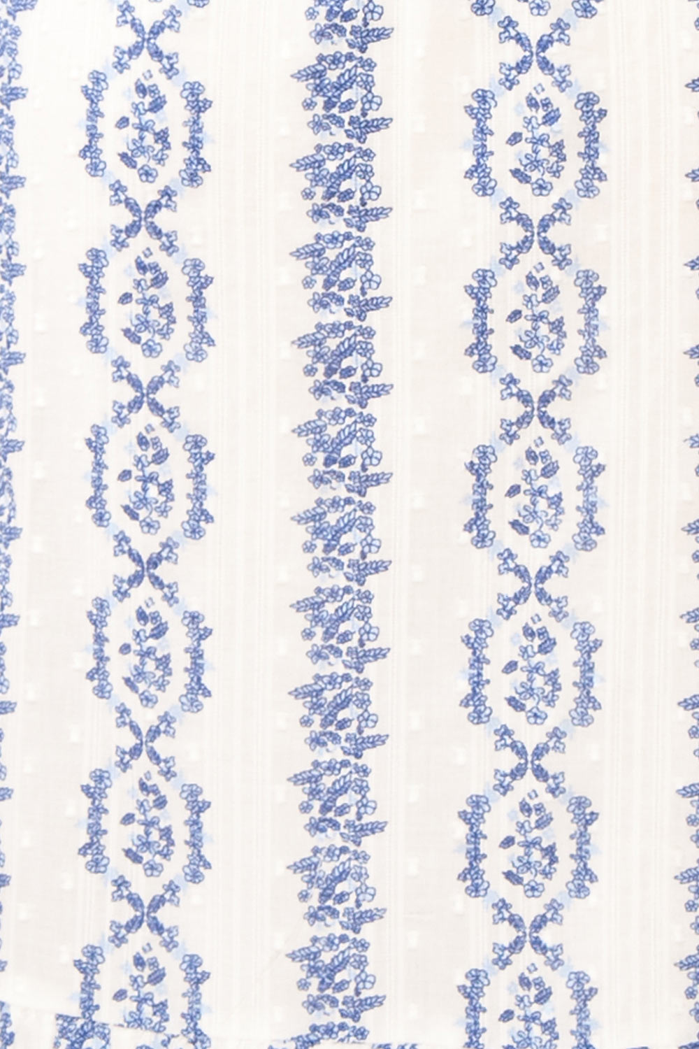 Eliris Long Floral White Dress w/ Long Sleeves | Boutique 1861  fabric