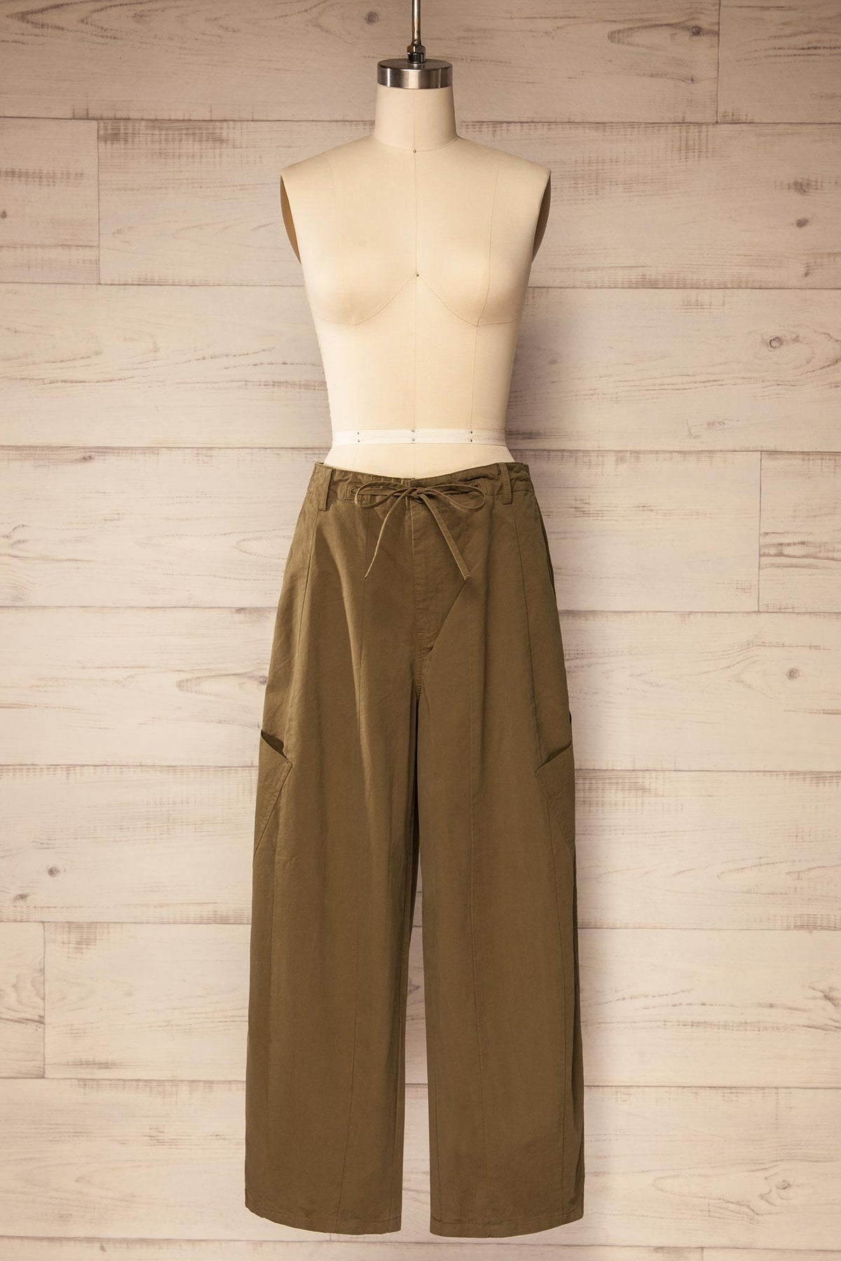 front view of Esker Khaki Barrel Leg Cargo Pants with Drawstring at La petite garçonne