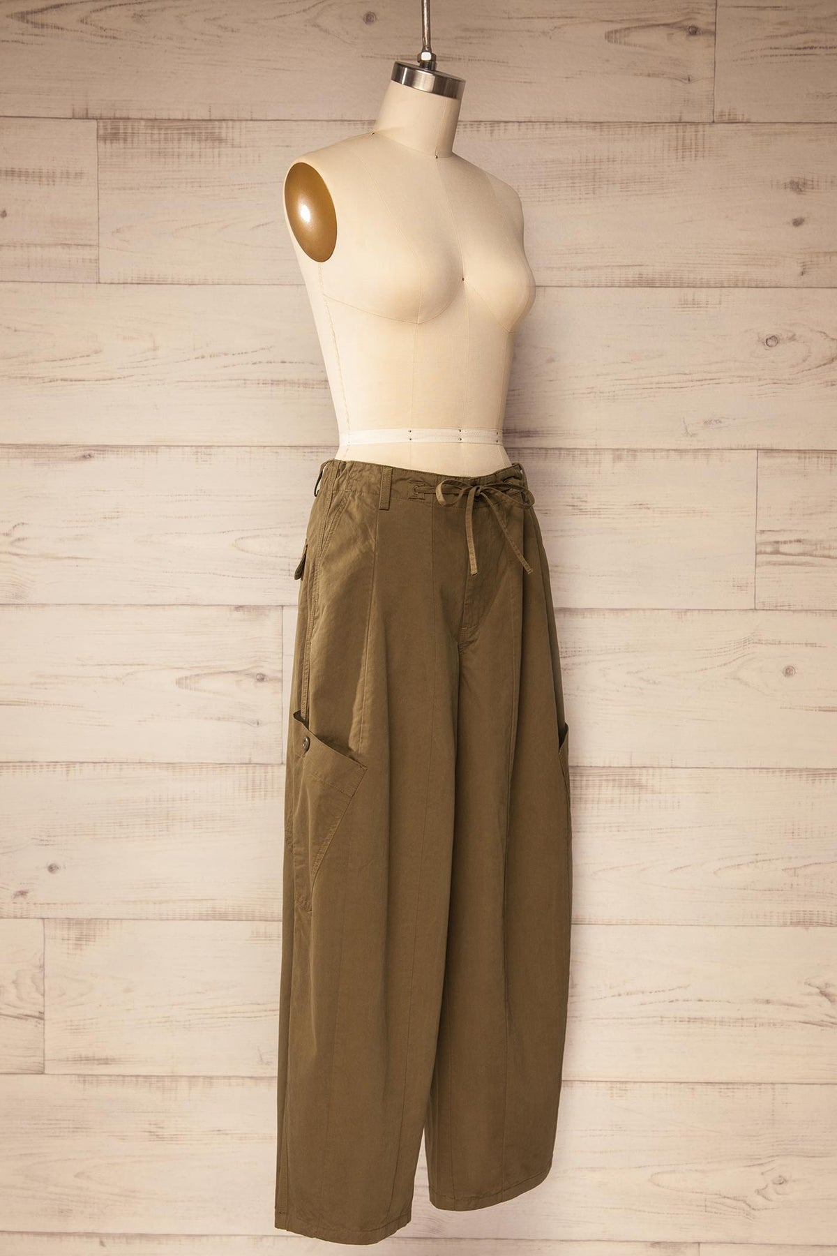 side view of Esker Khaki Barrel Leg Cargo Pants with Drawstring at La petite garçonne