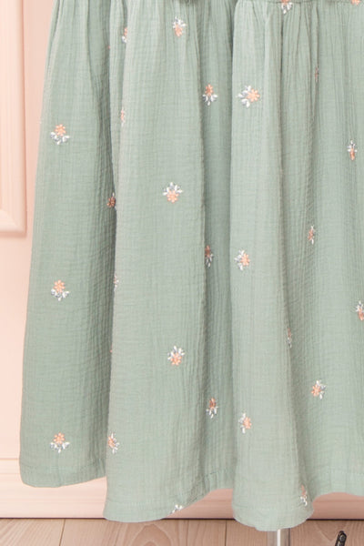 Estelle Blue Grey Midi Dress w/ Floral Embroidery | Boutique 1861 bottom close-up