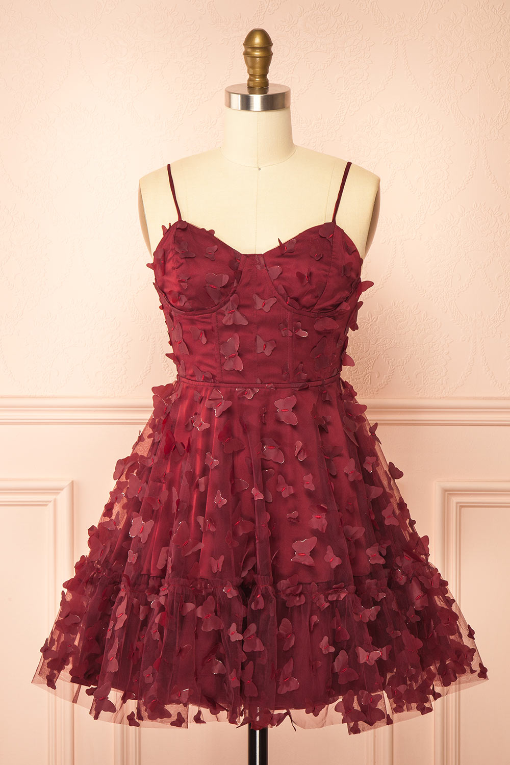 front view of a sewing mannequin wearing Faya Burgundy Short Corset Dress with Butterflies from Boutique 1861
