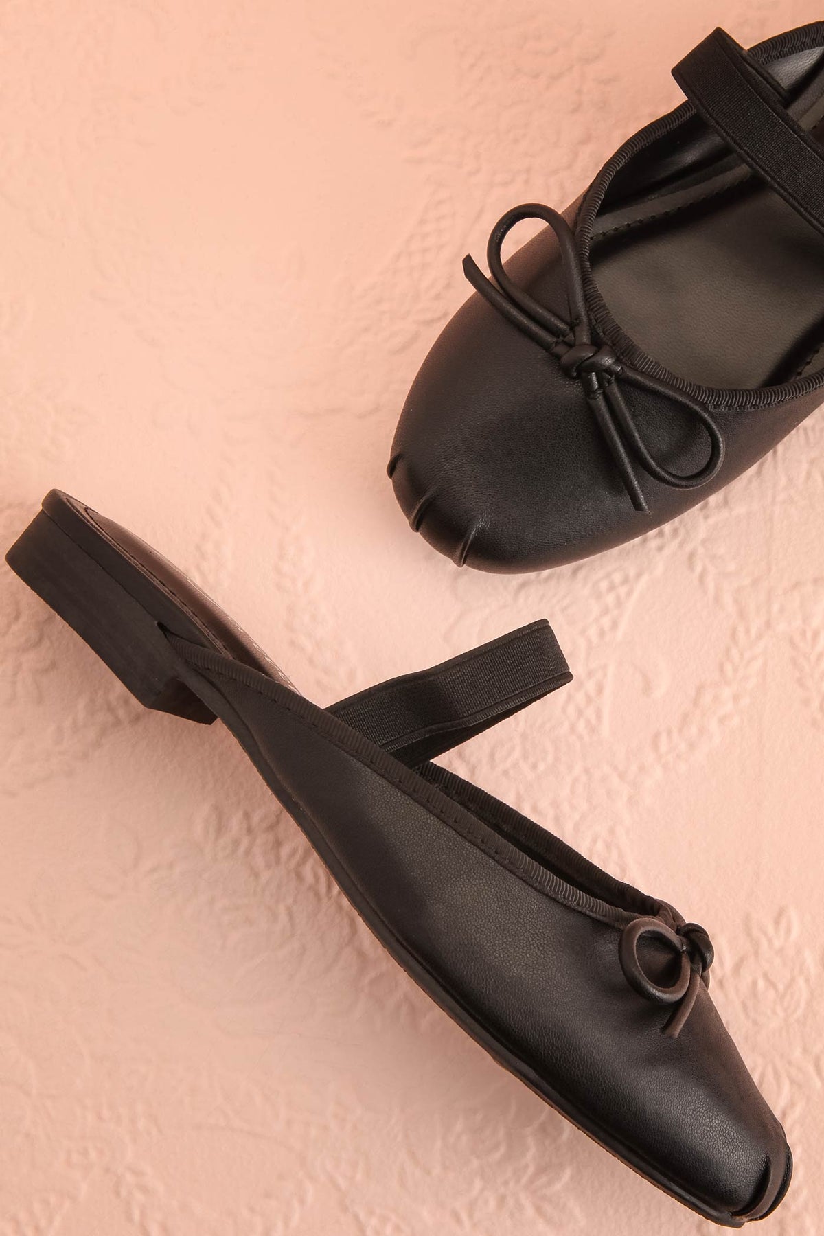 flat view of Finnian Black Ballet Mule Flats at Boutique 1861