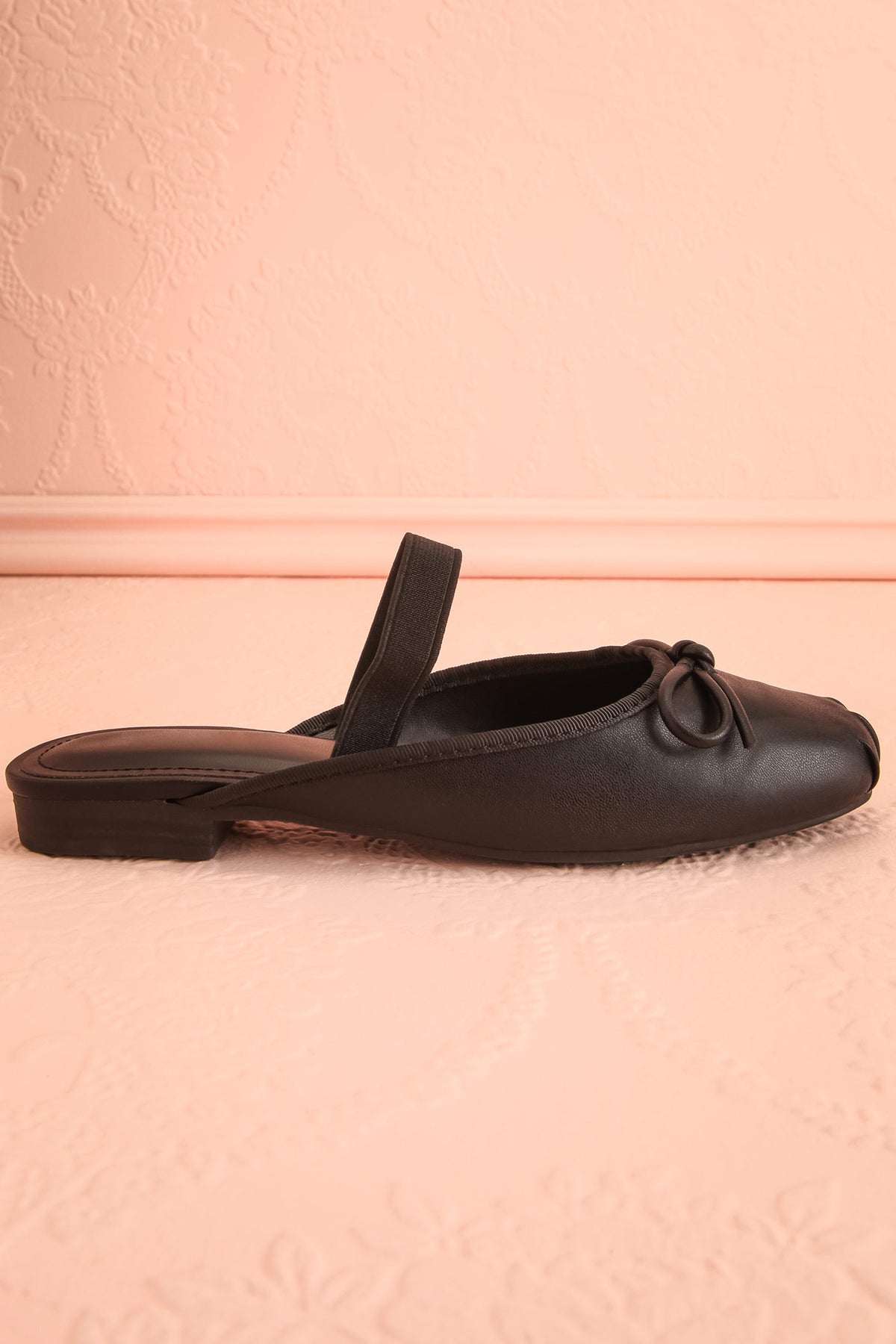 side view of Finnian Black Ballet Mule Flats at Boutique 1861