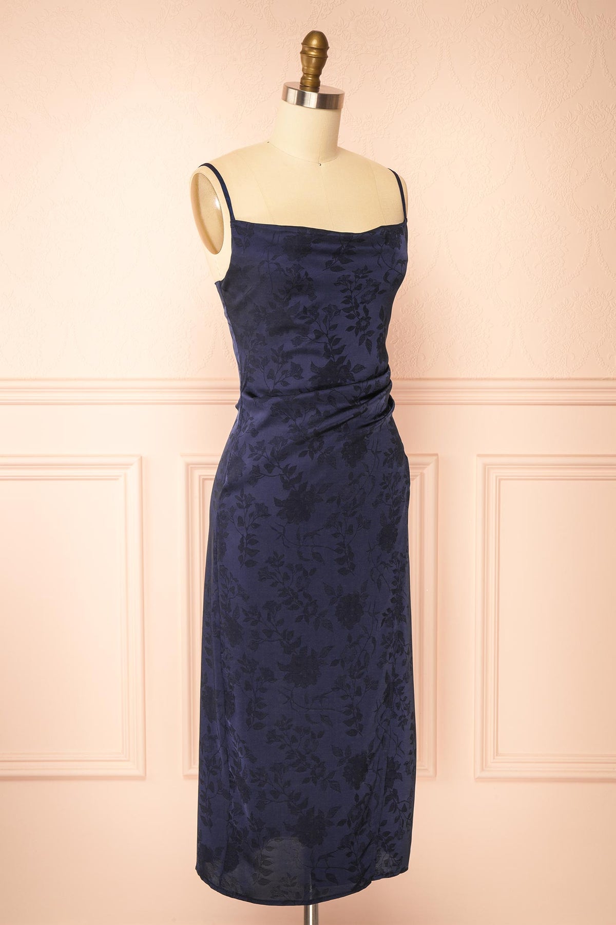 side view of Fyra Navy Cowl Neck Satin Jacquard Midi Dress at Boutique 1861