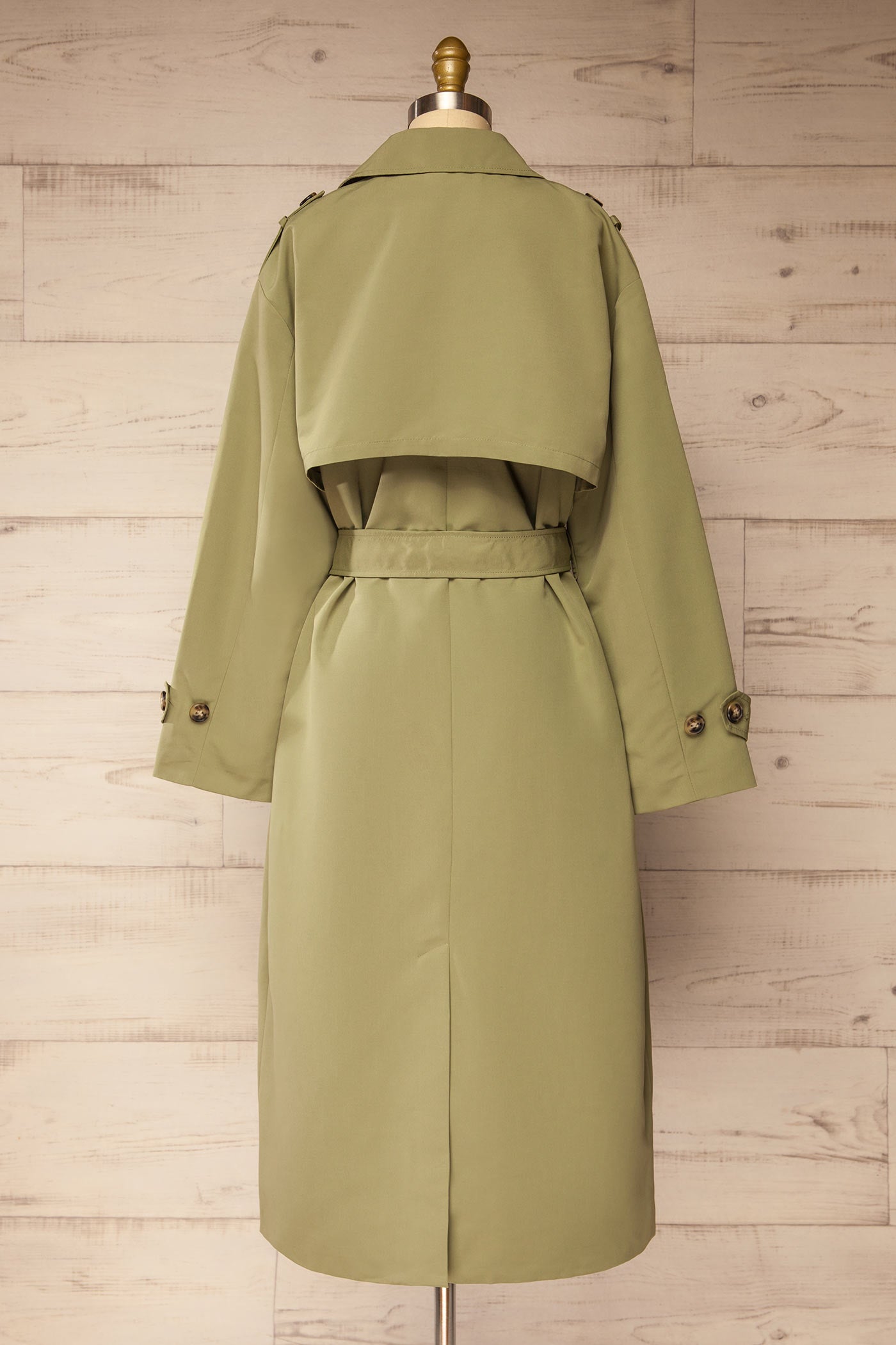 back view of Gembloux Sage Double Breasted Trench Coat at La petite garçonne