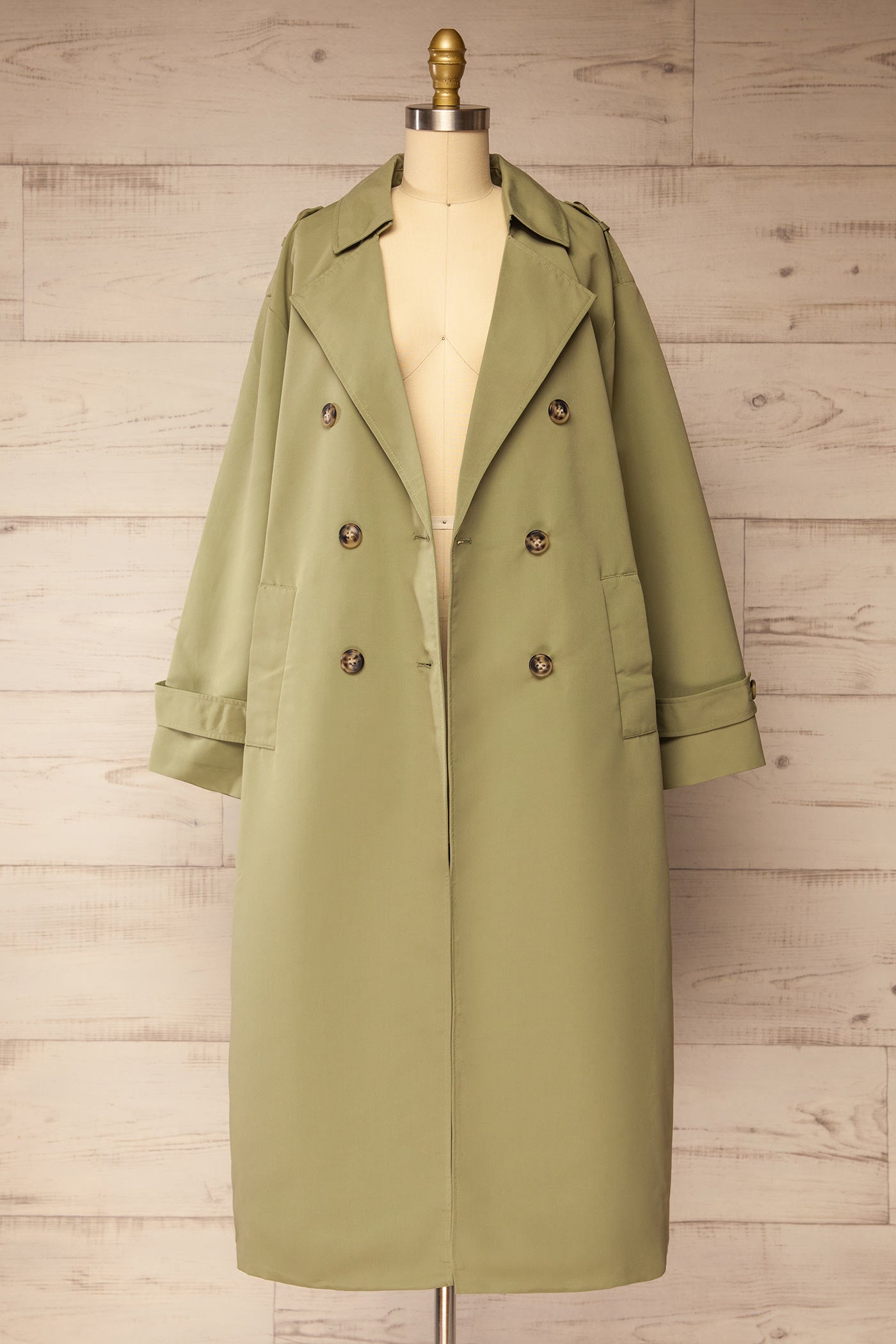 open view of Gembloux Sage Double Breasted Trench Coat at La petite garçonne