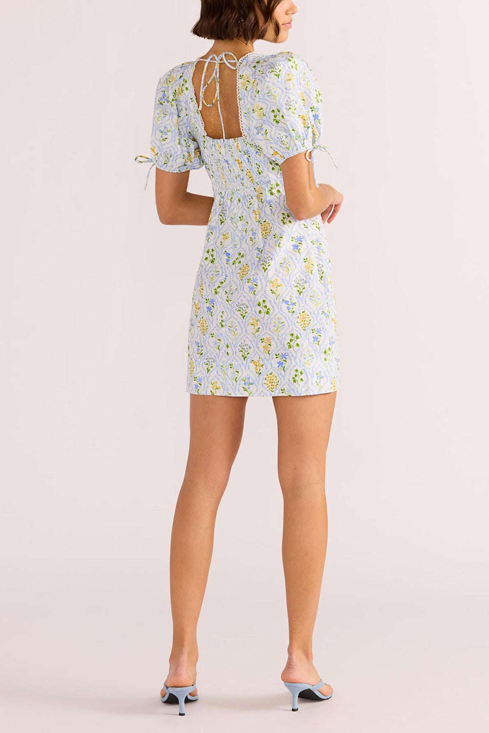 Germella Short Floral Dress w/ Puffy Sleeves | Boutique 1861 back model