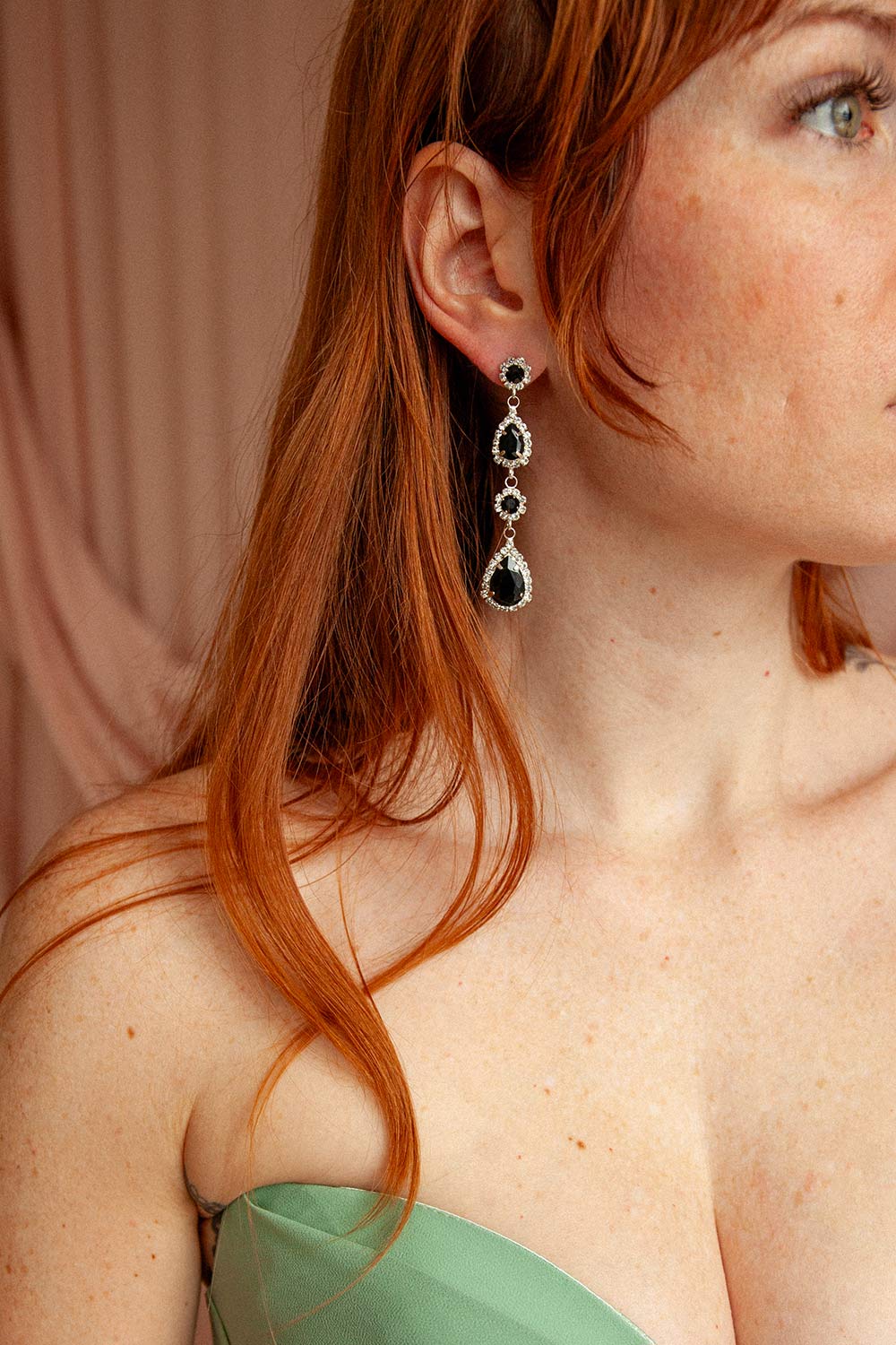 woman wearing Gladys Pendant Black and Silver Earrings from Boutique 1861