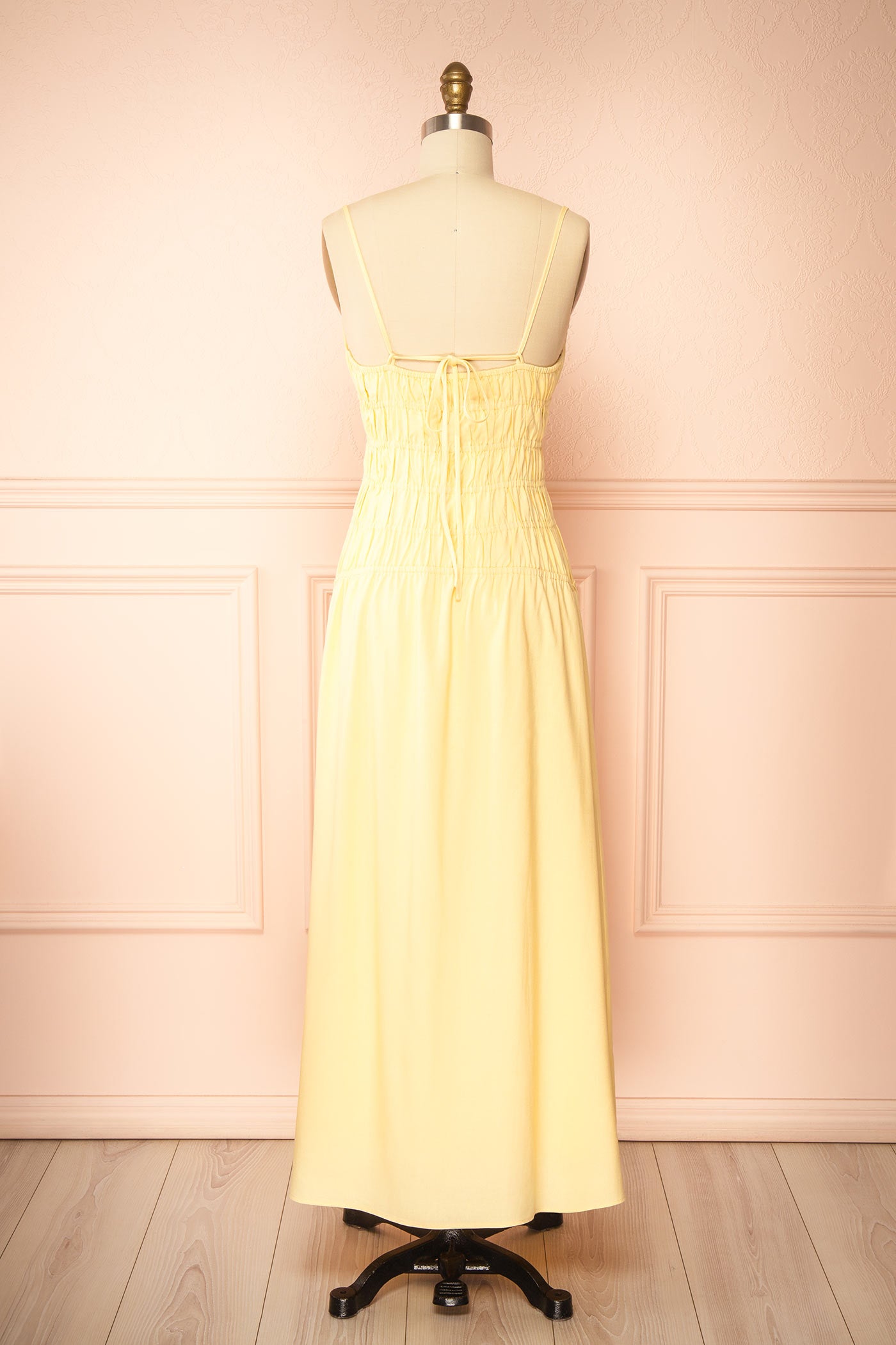 Back view Grazia Yellow Smocked Waist Maxi Dress with Cutout Detail at la boutique 1861