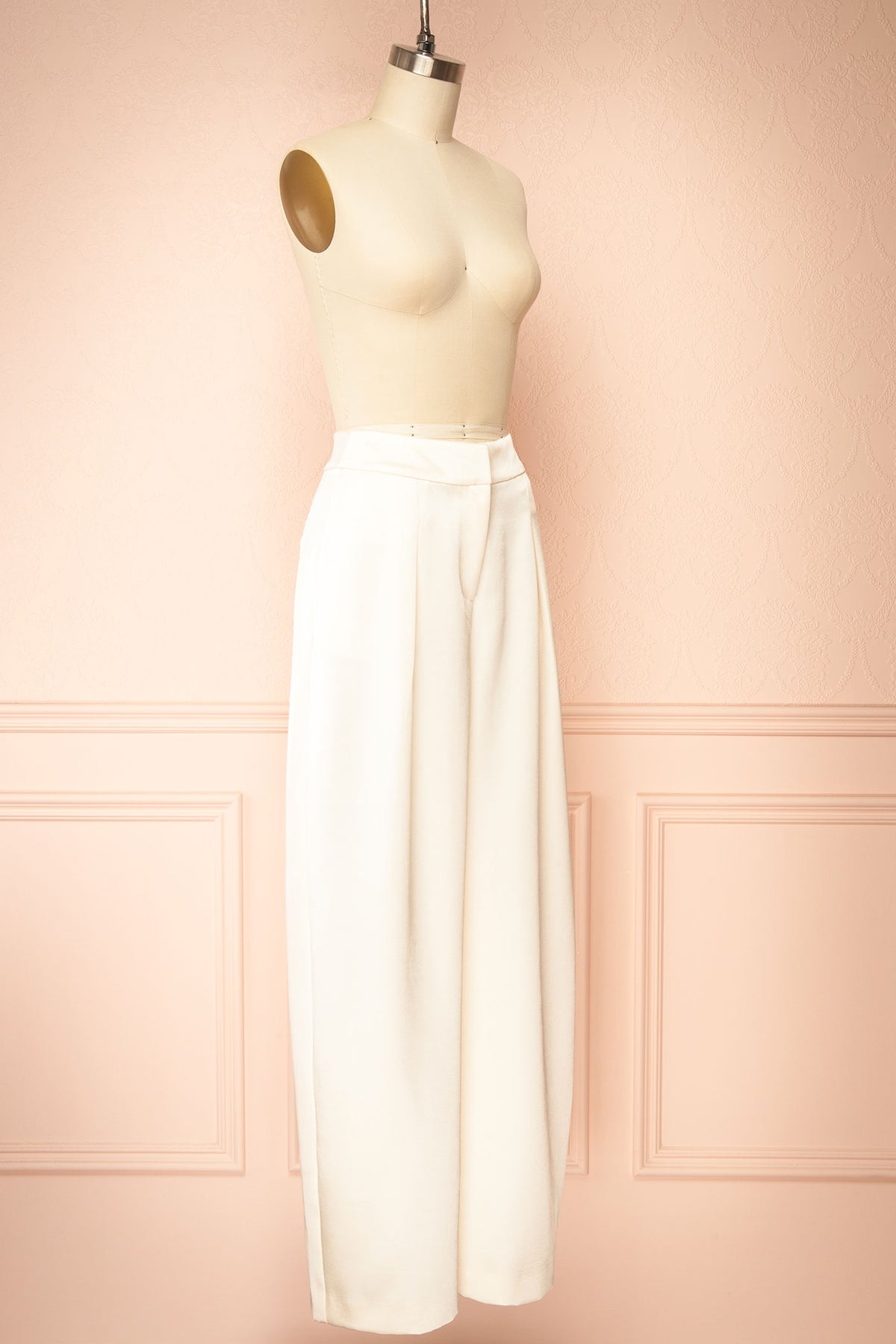 Side view of Guilda Ivory Wide-Leg Satin Pants at Boutique 1861