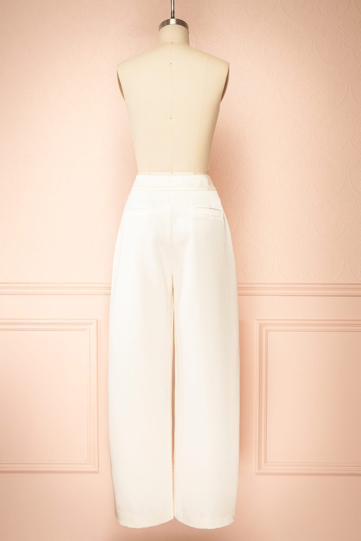 Back view of Guilda Ivory Wide-Leg Satin Pants at Boutique 1861