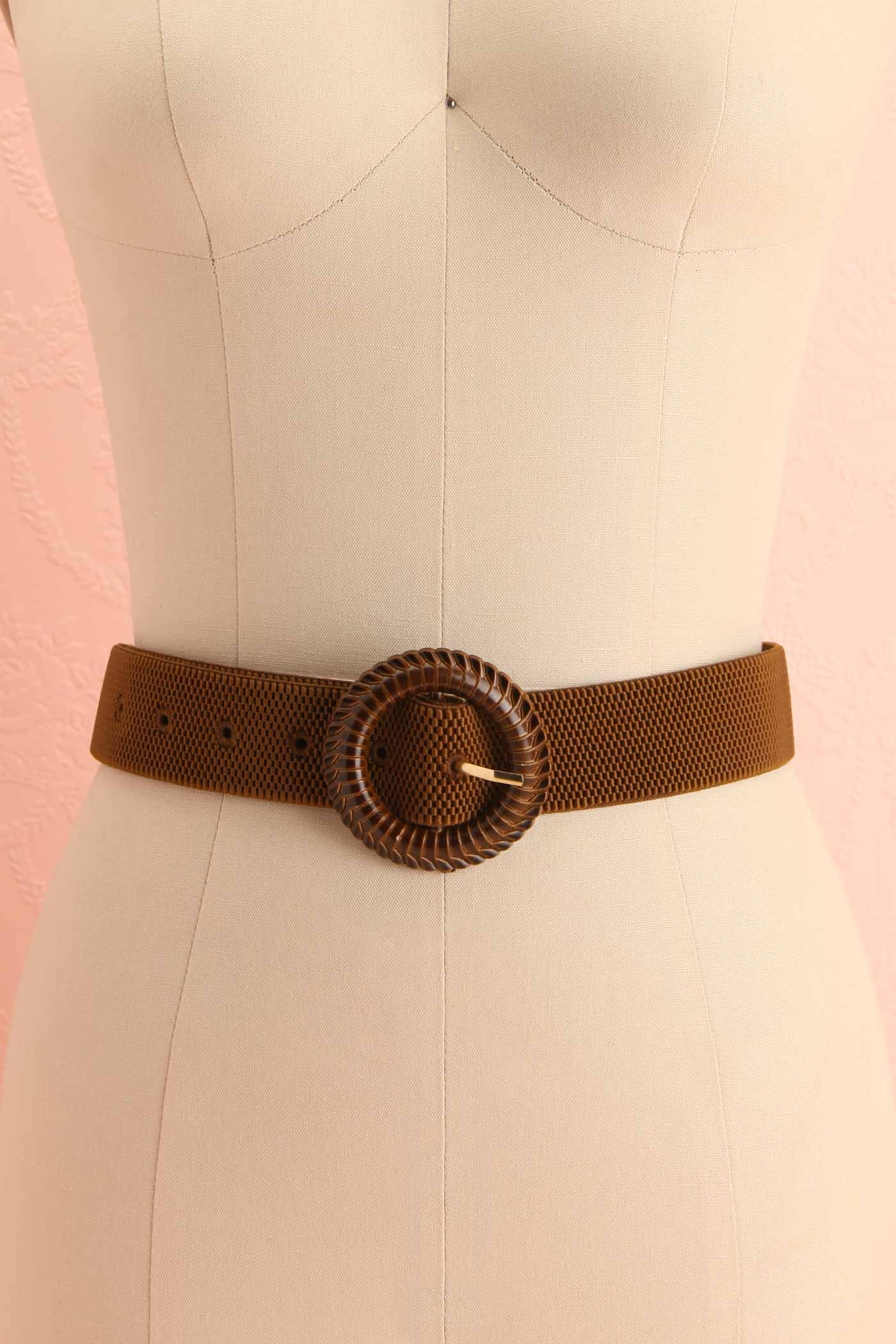 Frontview on mannequin Gumdrop Brown Woven Elastic Belt with Textured Round Buckle at boutique 1861