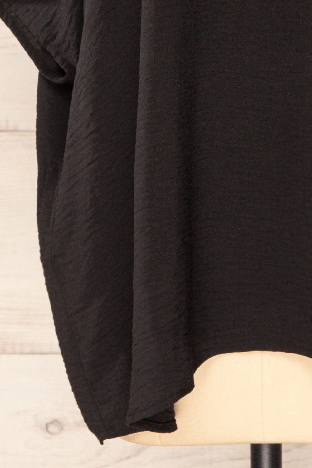 Haifa Black Oversized Short Batwing Sleeve Top | La petite garçonne bottom close-up