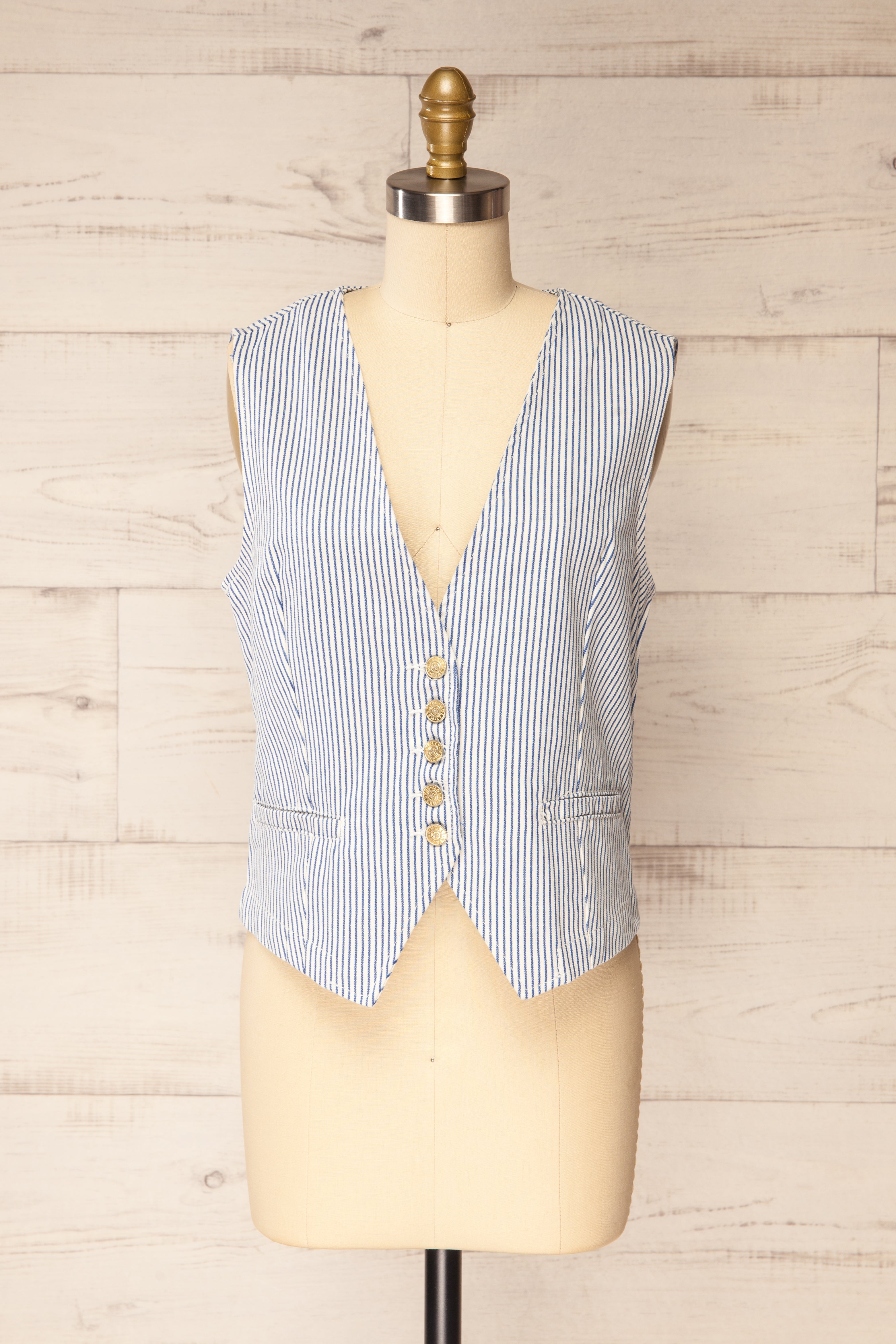 Frontview of Hajipur White and Blue Striped Denim Vest with Back Detail at la petite garçonne