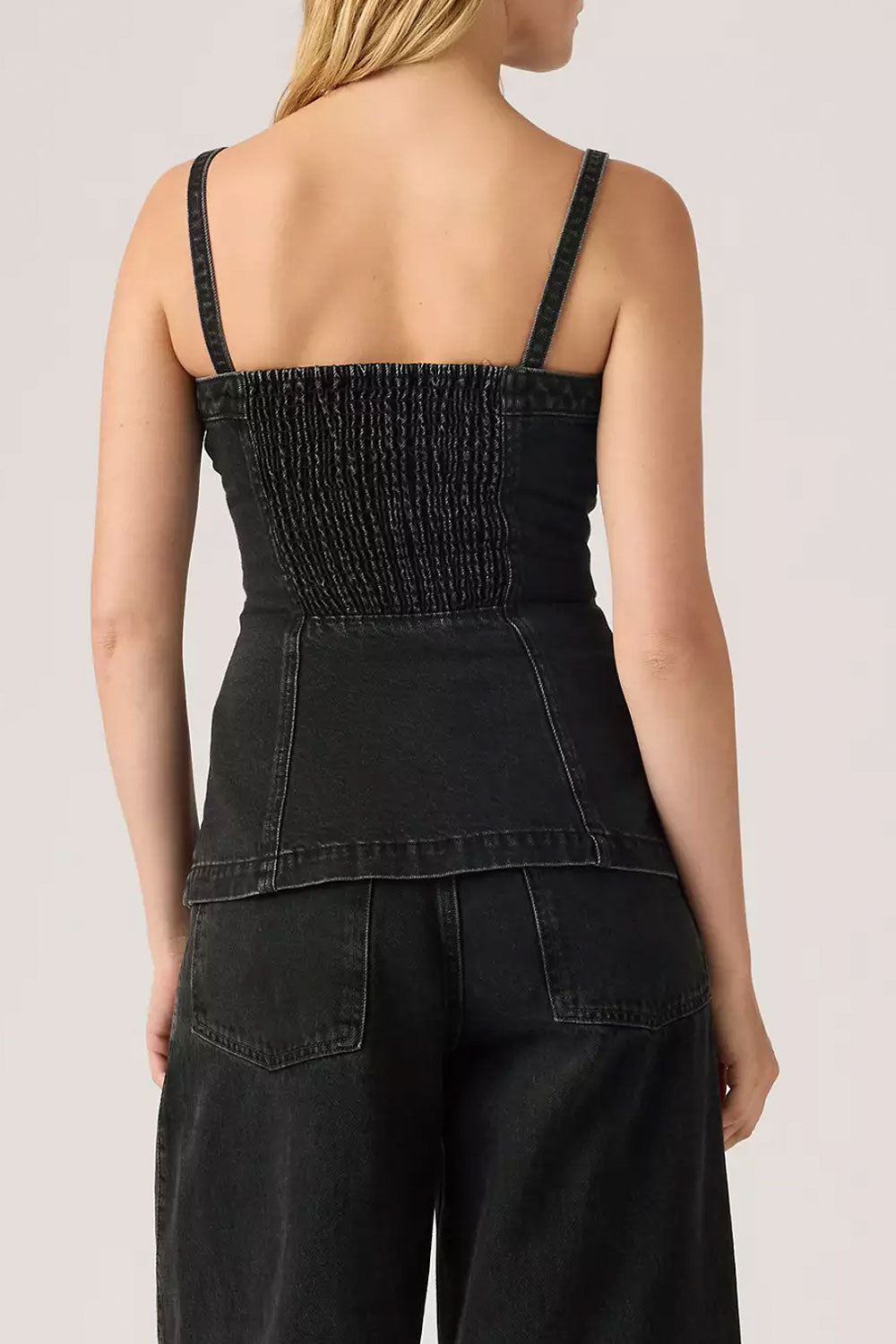 Woman wearing Harare Black Denim Bustier with Pockets from La petite garçonne backview