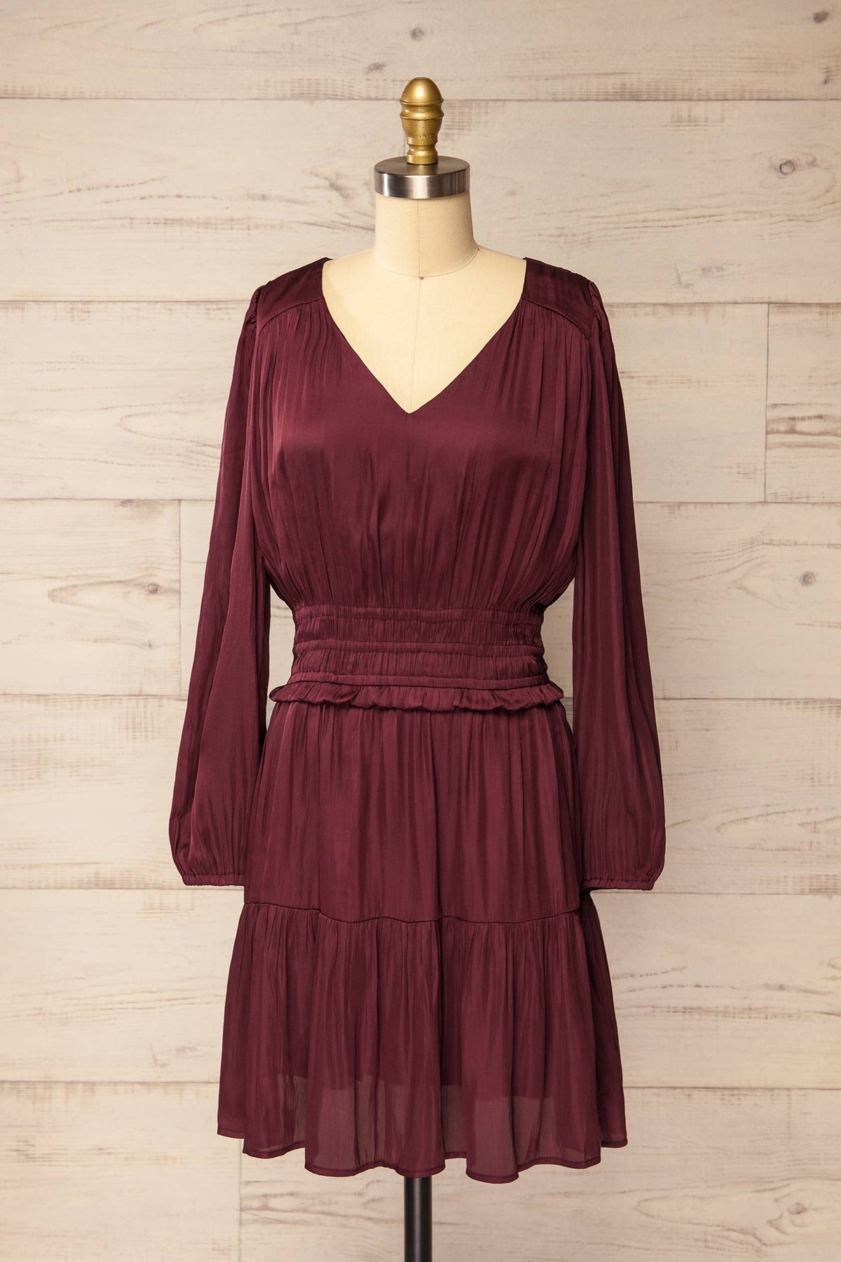 front view of Harrisburg Burgundy Long Sleeve Satin Smocked Mini Dress at La petite garçonne