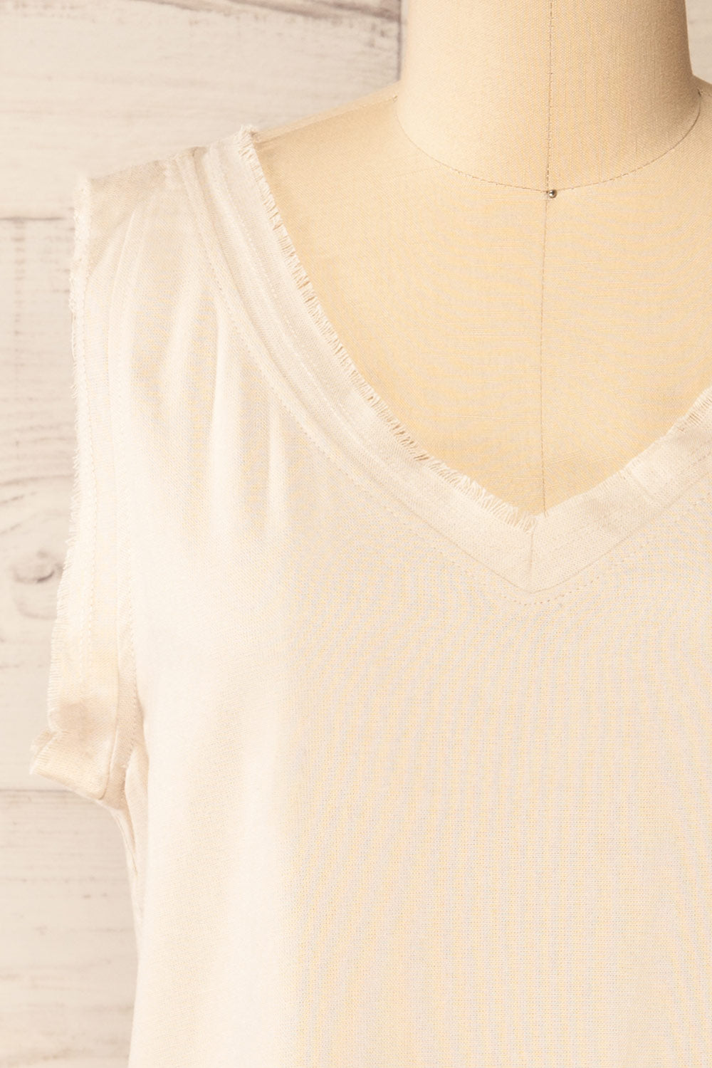 Helsinki Beige V-Neck Tank Top w/ Frayed Hem | La petite garçonne front close-up