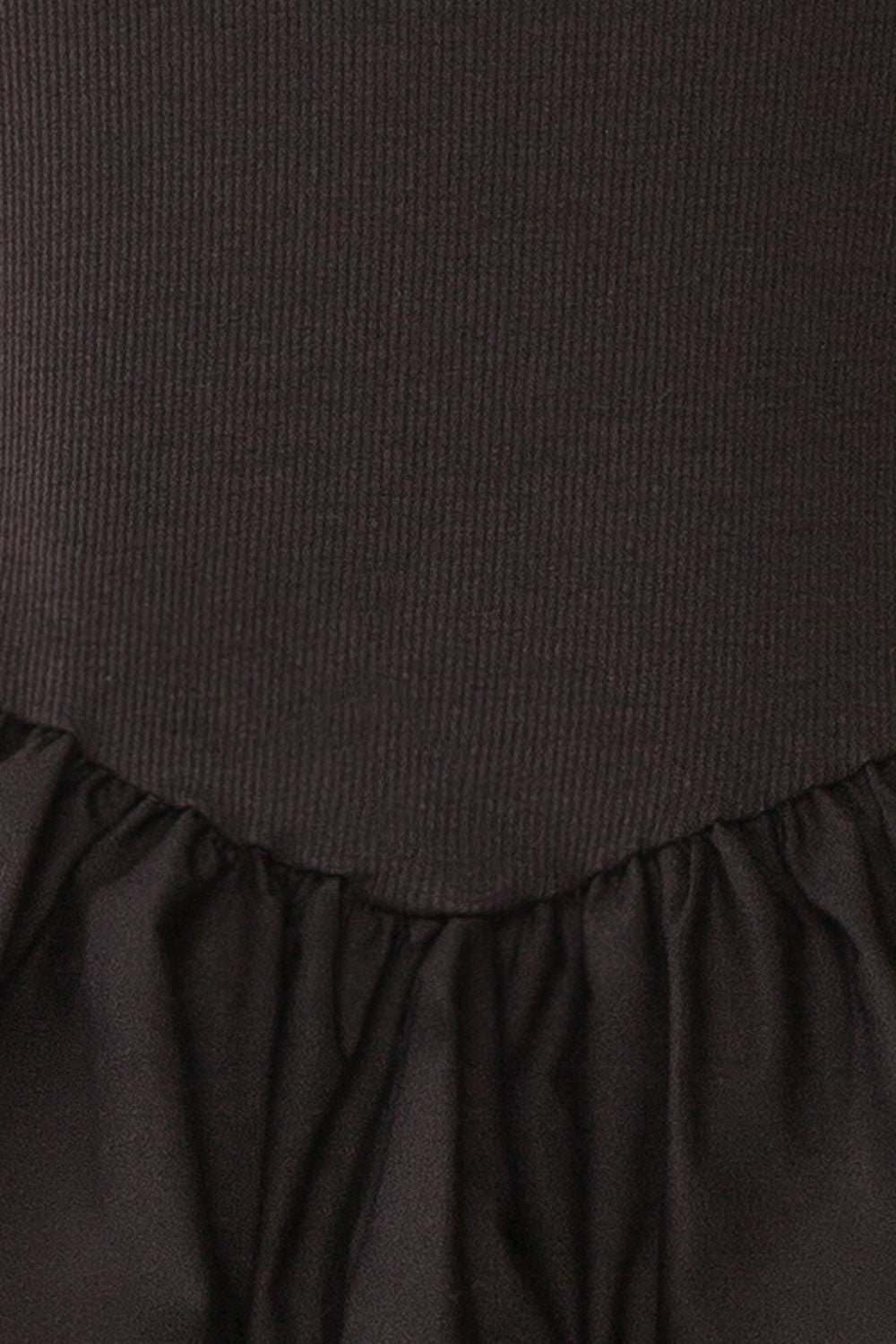 Henrieta Black Fitted Top with Peplum | Boutique 1861 fabric