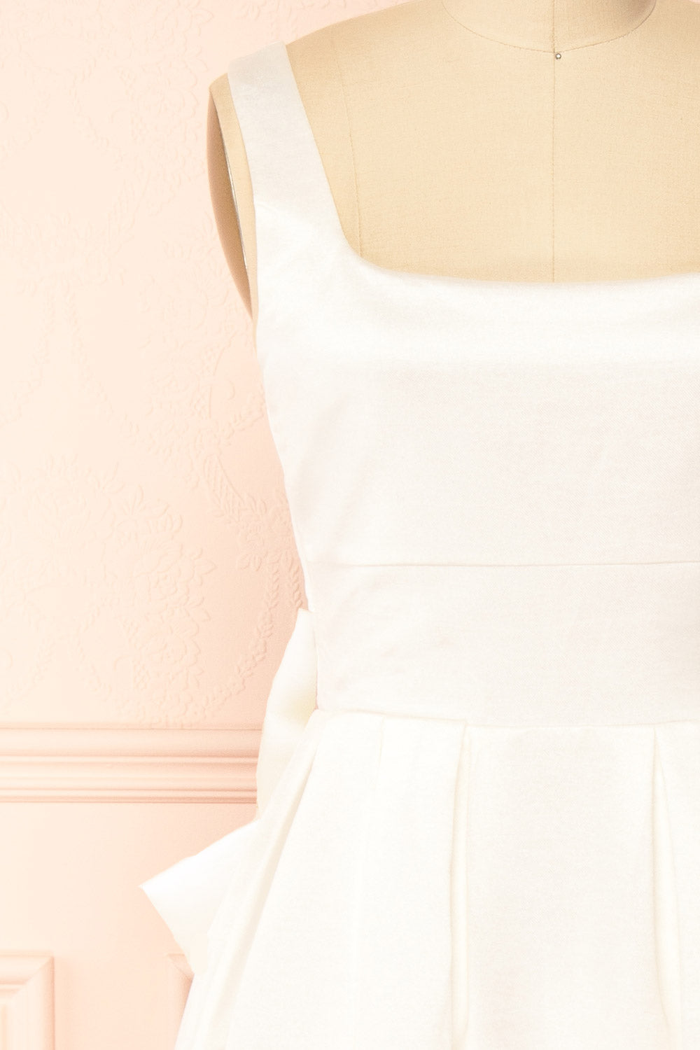 Hestiane Ivory Maxi A-Line Dress | front side view with bow