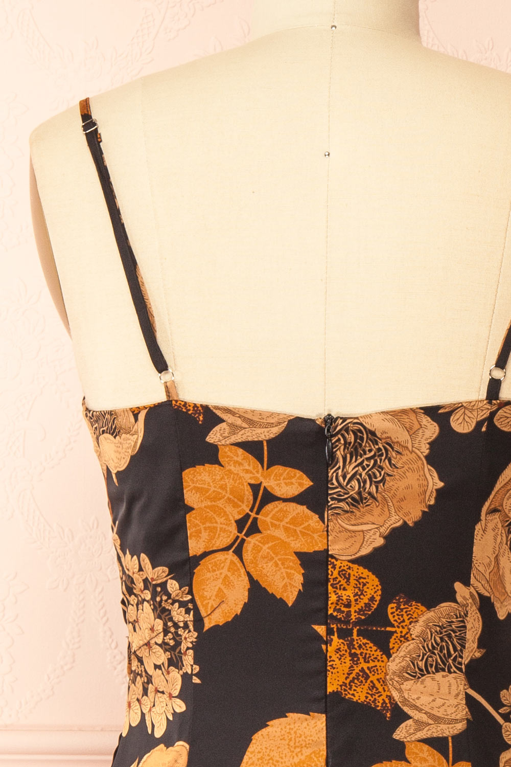 back of sewing mannequin wearing Hinaya Black Floral Cowl Neck Satin Midi Slip Dress from Boutique 1861