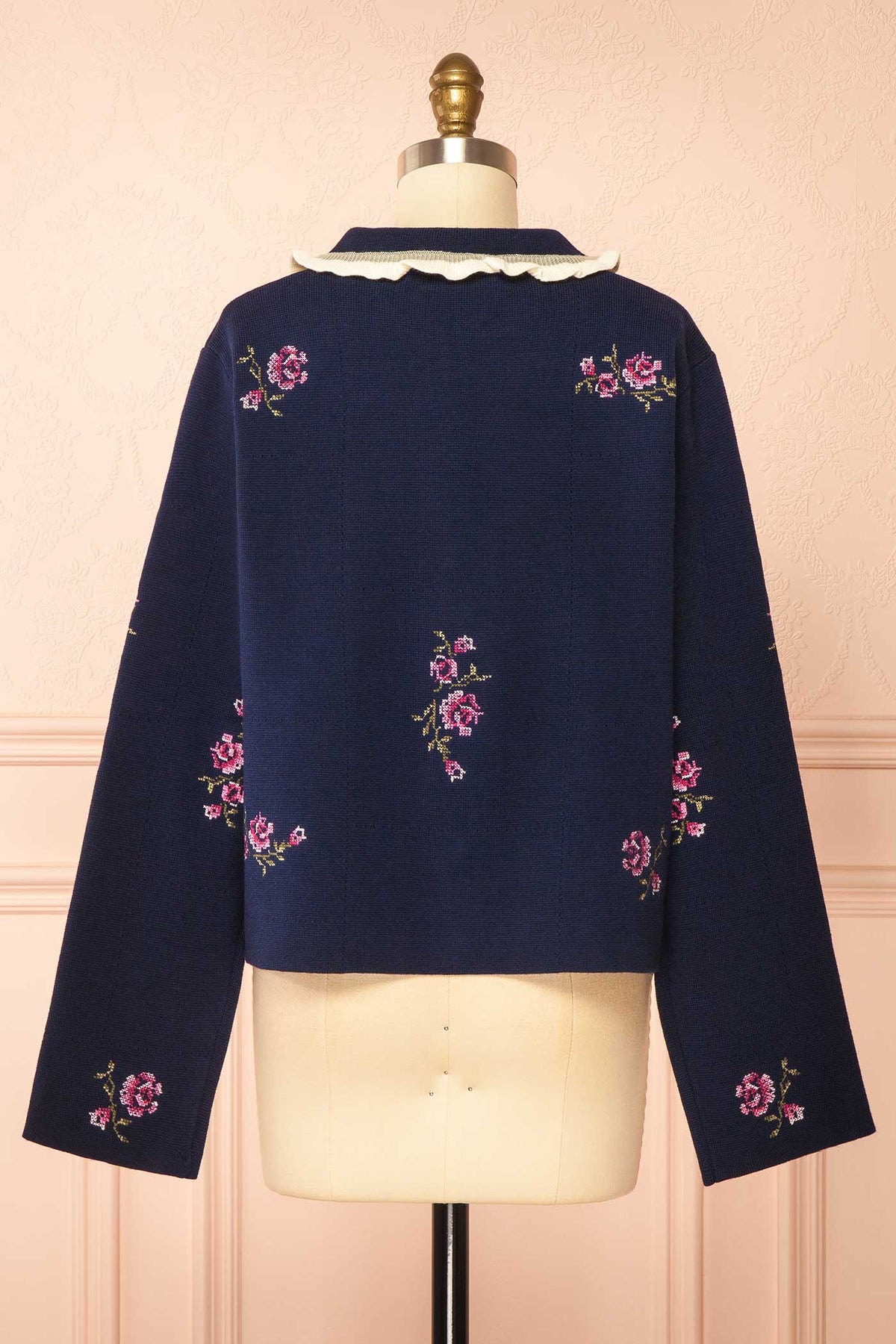 back view of Ichigo Navy Knit Cardigan with Embroidery Flowers at Boutique 1861