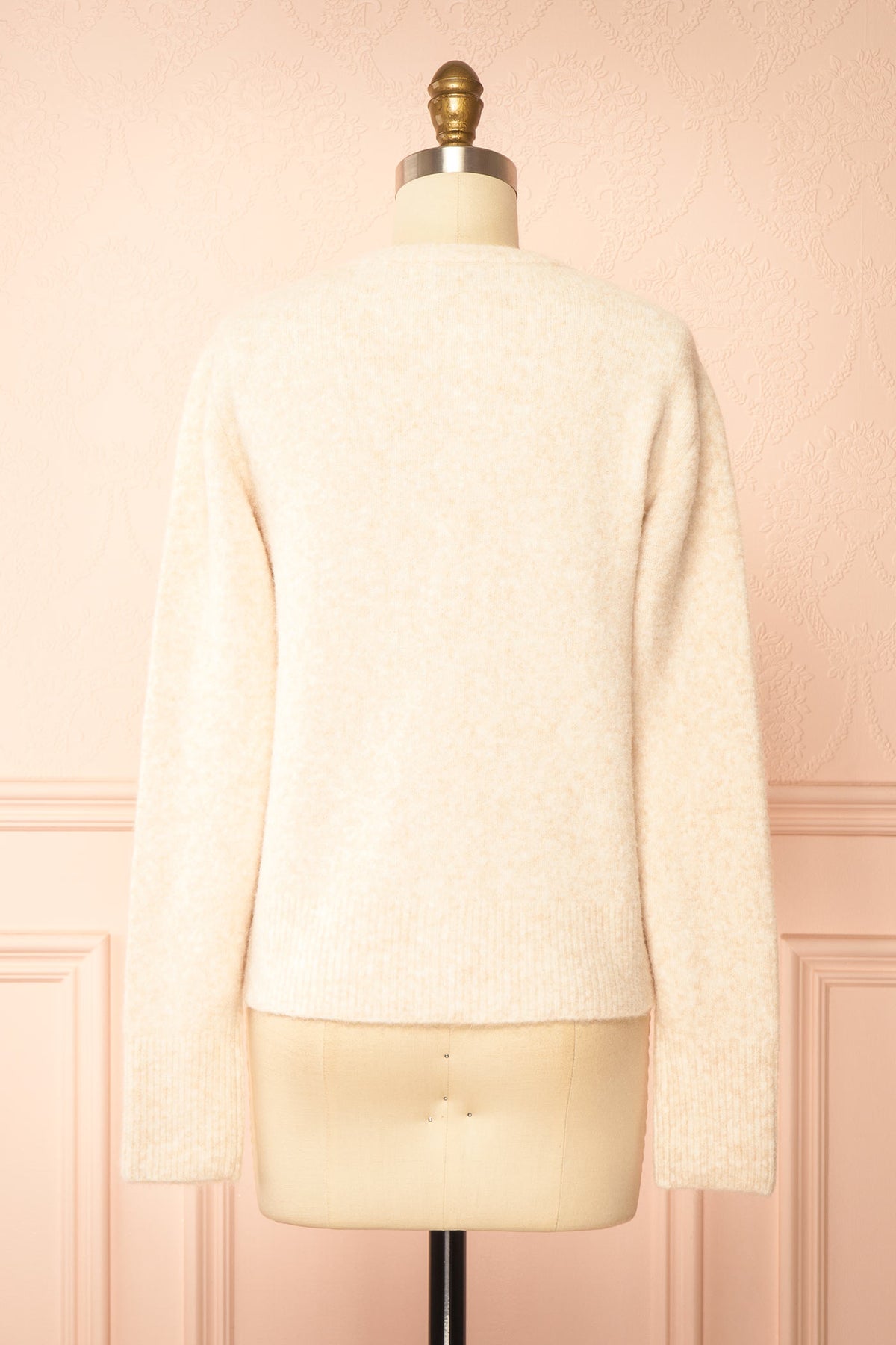 back view of Idalia Ivory Round Neck Cardigan With Button Front at Boutique 1861