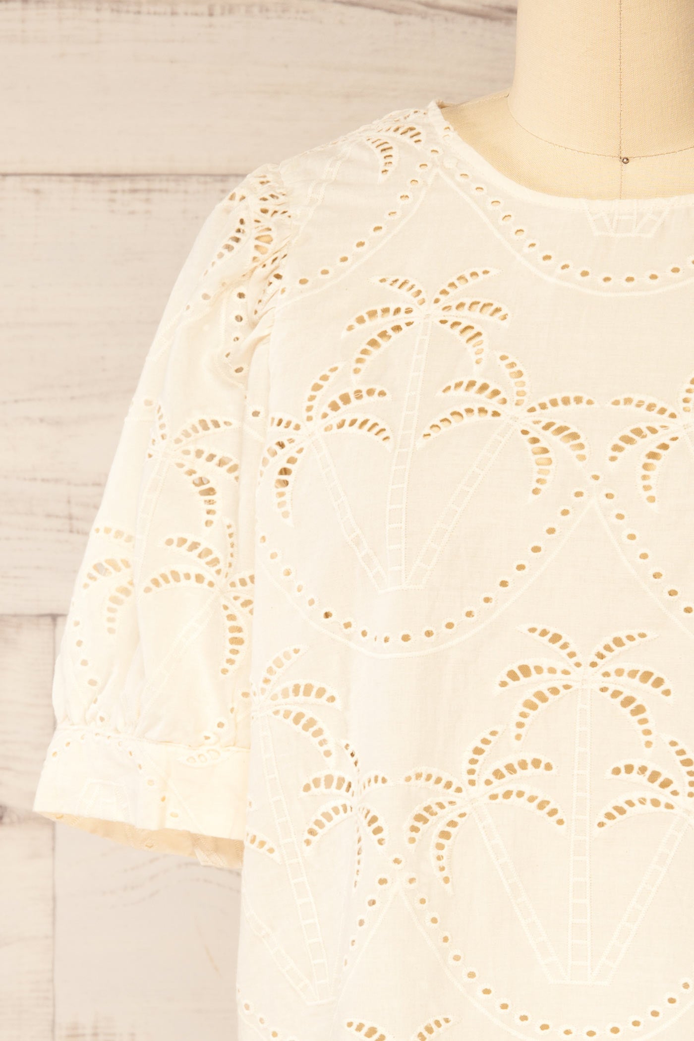 close-up Jadra Beige Palm Tree Eyelet Blouse with Cuffed Sleeves at la petite garçonne