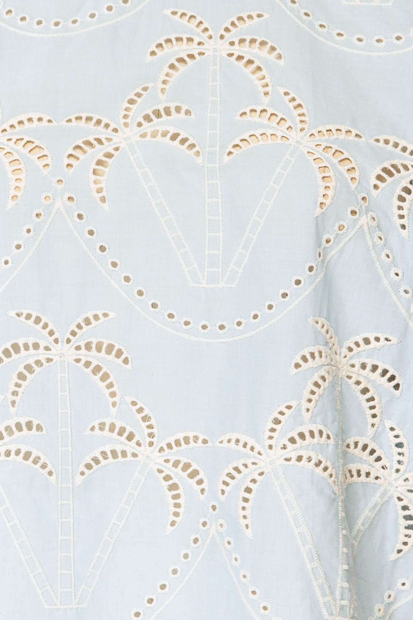 Close-up of Jadra Blue Blouse with palm design at la petite garçonne